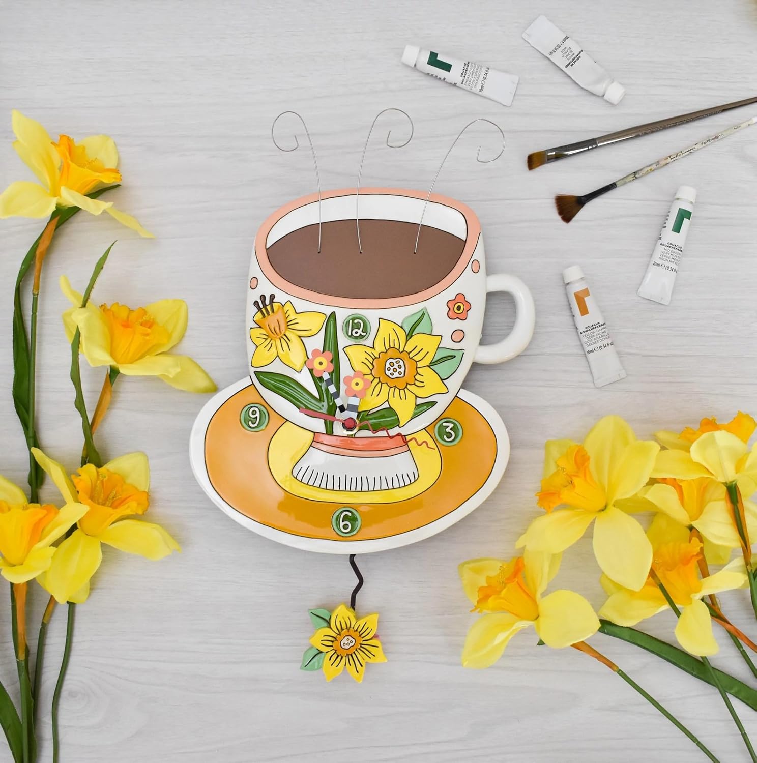 Enesco Allen Designs Flower Coffee Cup of Joy Wall Clock - Battery Operated Pendulum Analog Clock, Stone Resin Decorative Clocks for Walls Home Decor Kitchen Clocks, 13 Inch