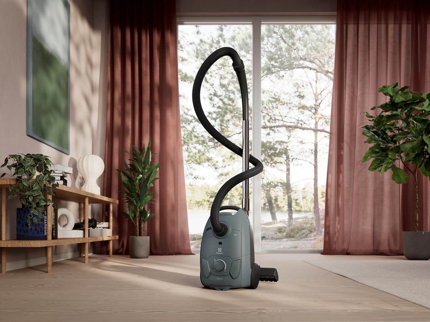 Electrolux Clean 500 Vacuum Cleaner in a living room setting, demonstrating its use.
