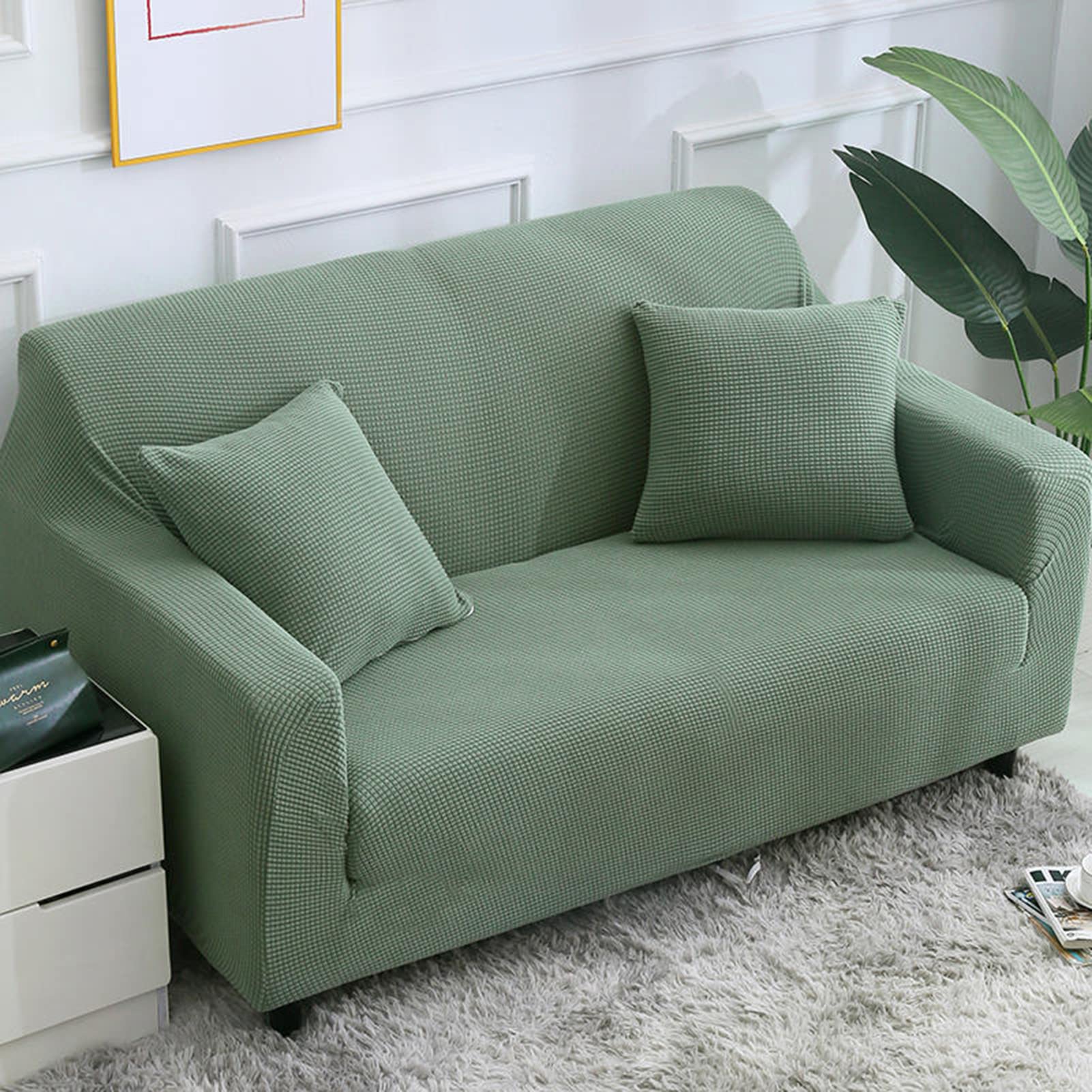 Housse de canapé jacquard extensible anti-glisse pour rénover un meuble usé de salon
