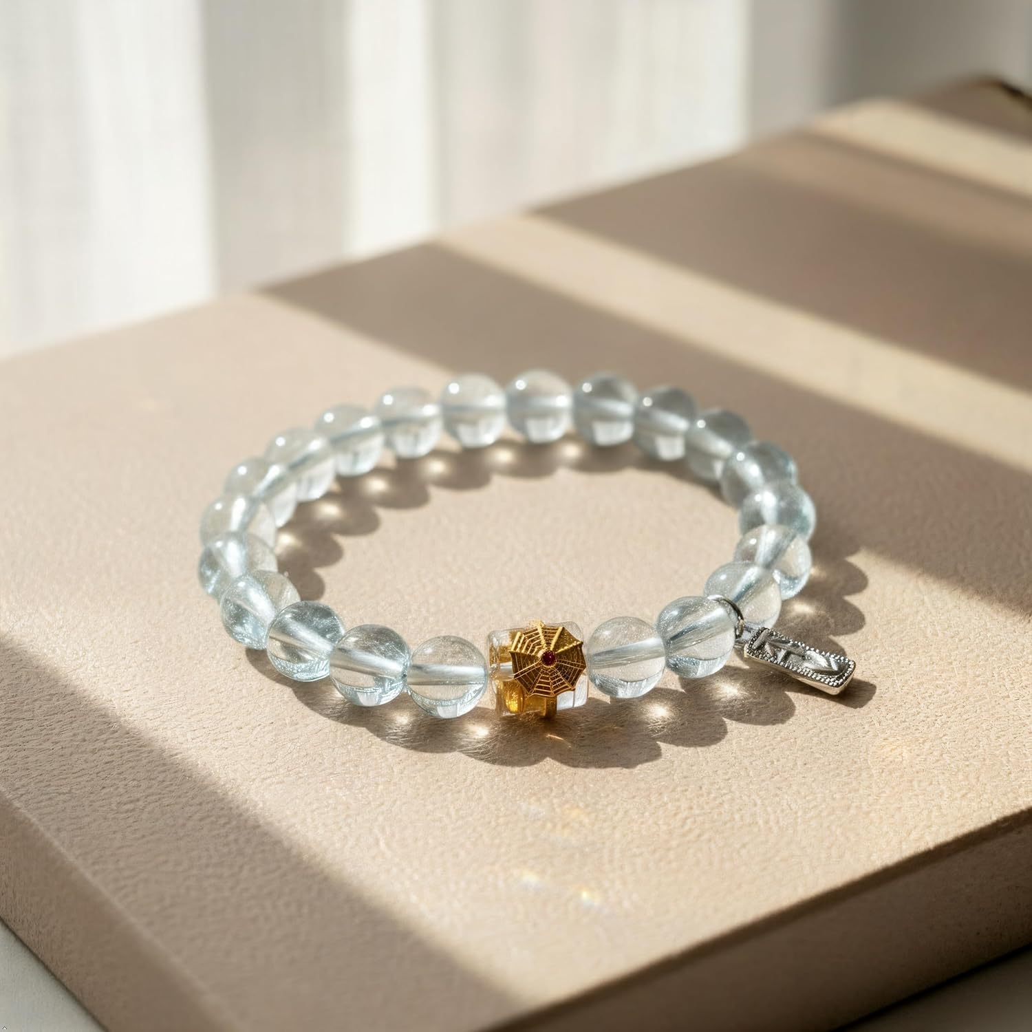 Aquamarine Beaded Bracelet with Gold Ruby Accent Bead and Silver Charm, Natural Blue Gemstone, Elastic Stretch