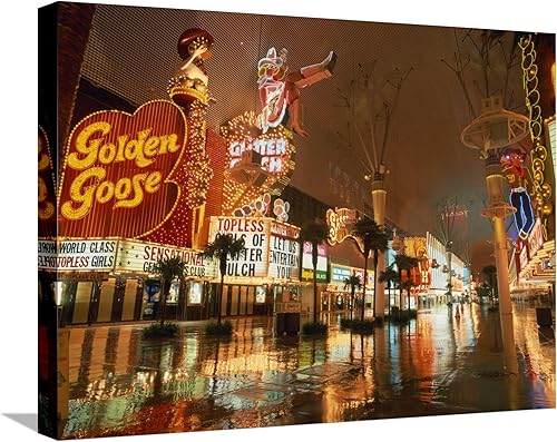 Miniatura 1 de AllPosters Lienzo estirado Reflexiones nocturnas en la calle húmeda de letreros de neón a lo largo de la calle Fremont en Las Vegas, Nevada, EE.