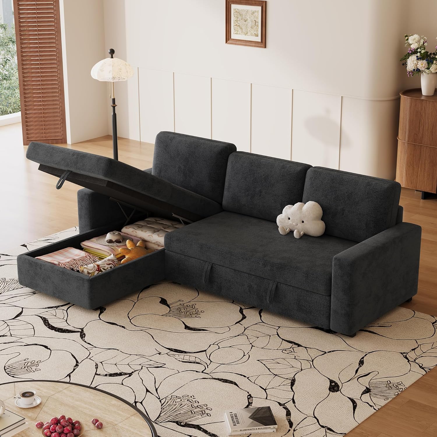 storage chaise compartment open with blankets inside