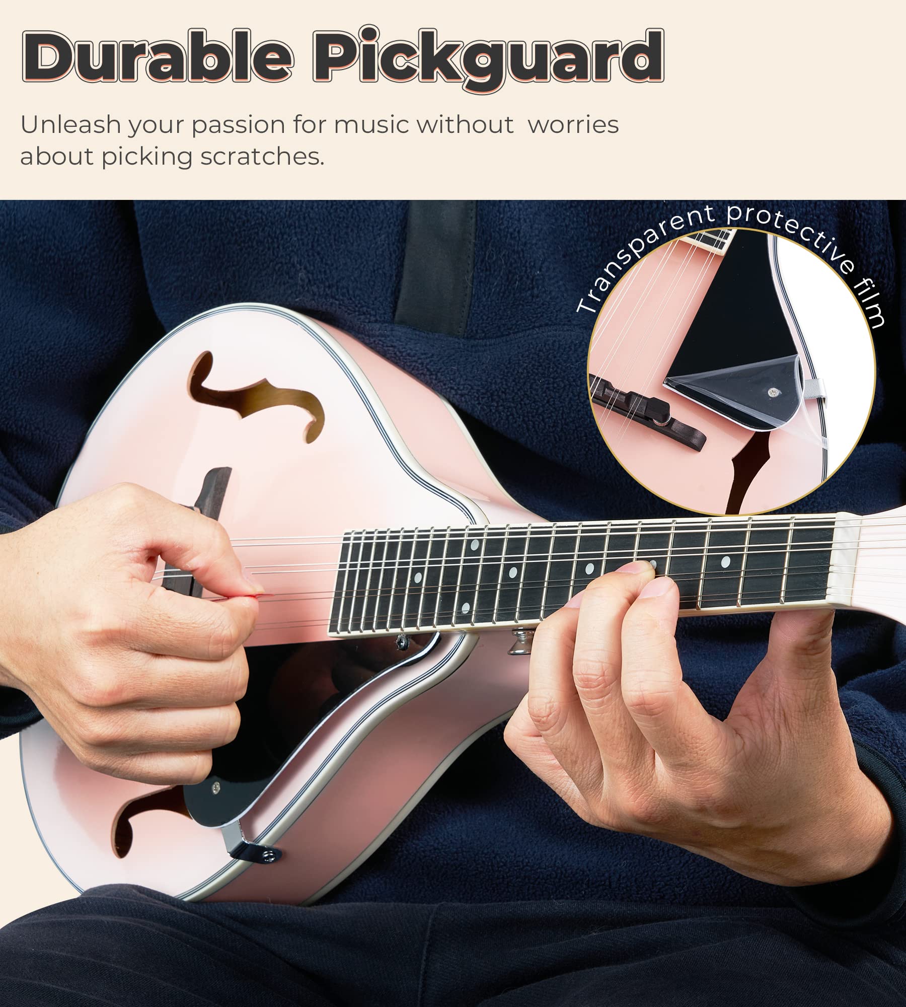 Person's hand demonstrating use of the pickguard on the mandolin