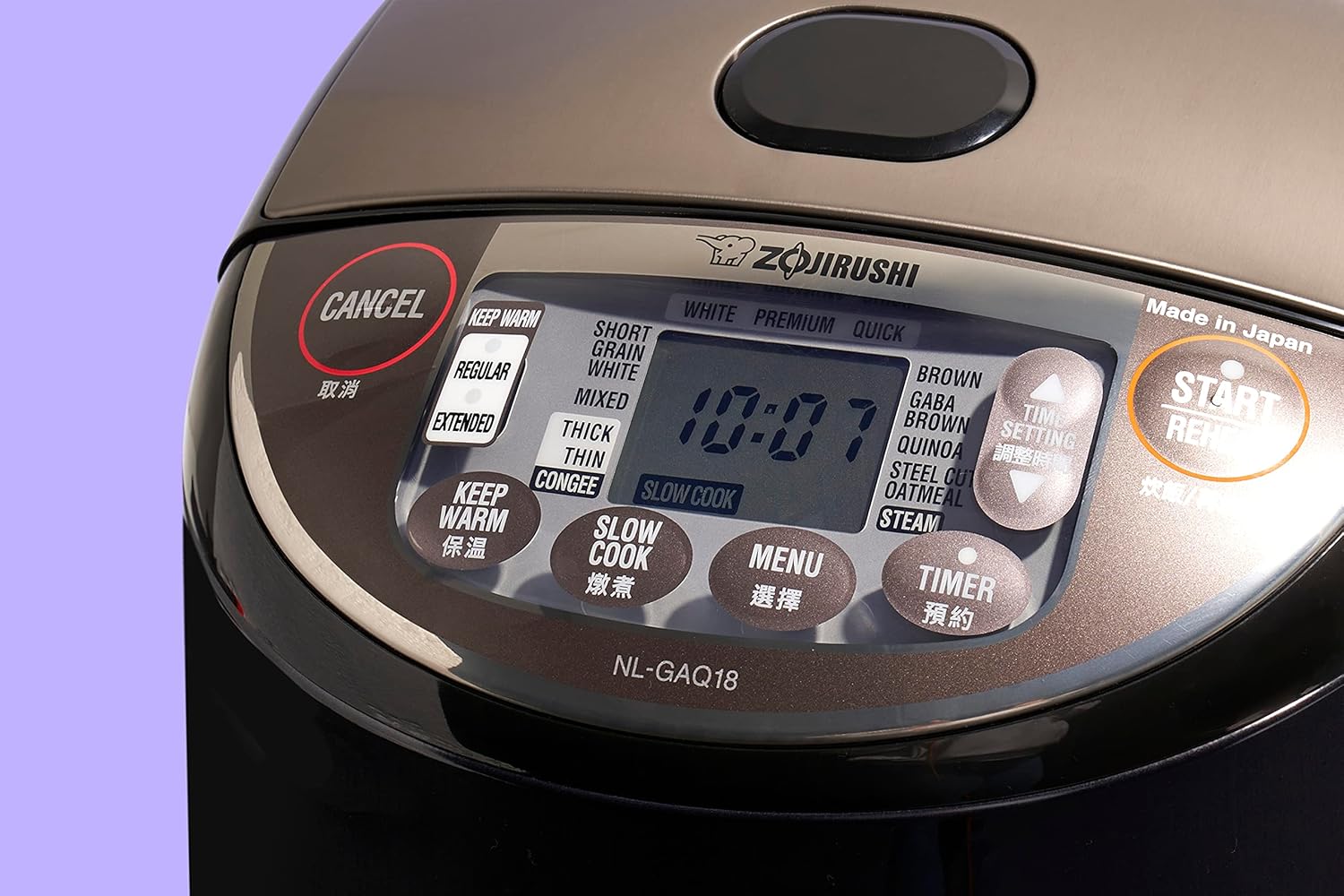 Close-up view of the Zojirushi NL-GAQ10 control panel with various cooking menu options and buttons