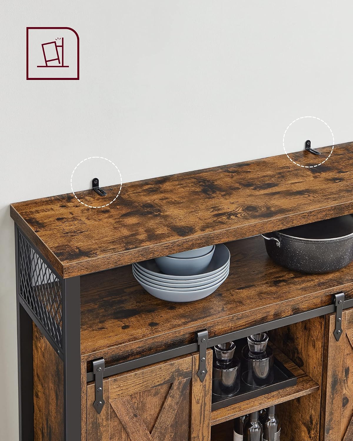 Close-up of the anti-tip kit installation on the VASAGLE LSC092B01 Sideboard, showing brackets attached to the top surface and wall.