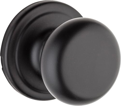 Kwikset Hancock - Pomo de puerta de paso interior, manija para puertas de armario y pasillo, pomo de puerta sin bloqueo en negro mate, con