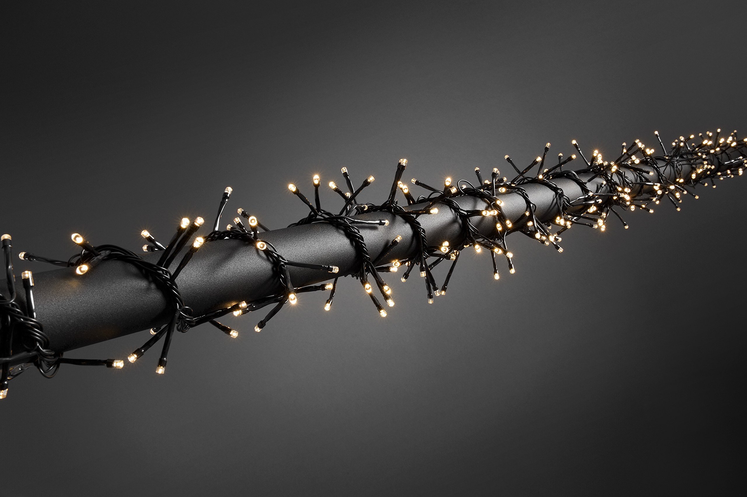 Konstsmide catena luminosa LED a Cluster, con Off e sensore luminoso, timer, per esterni, IP44, 480 diodi a luce bianca calda, funzionamento a batteria, cavo nero, 4 x D 1,5 V exklusiv 3736 – 100