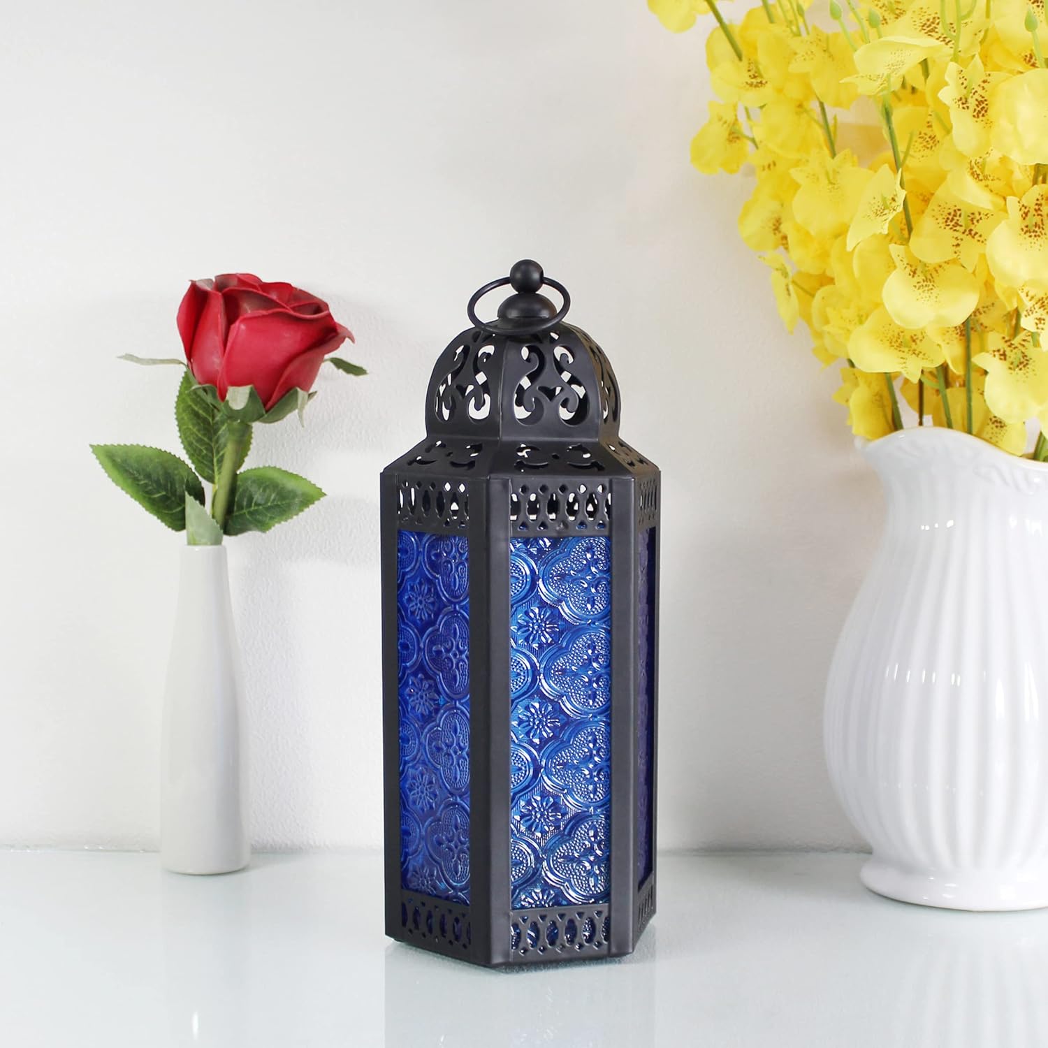 CVHOMEDECO. Decorative Candle Lantern Moroccan Lanterns Vintage Black Metal Lantern Holder for Home Patio Outdoor Decor. Cobalt Glass, Medium