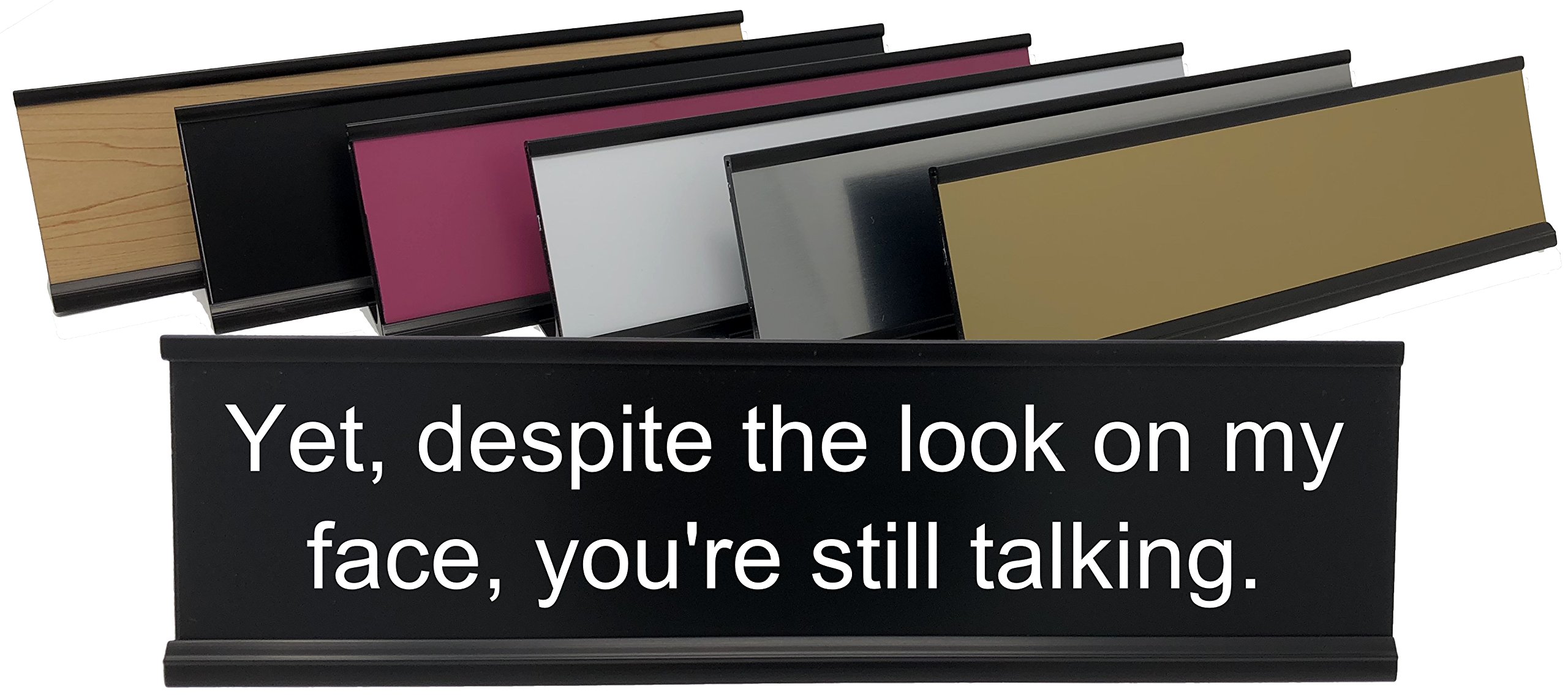 Yet, Despite The Look on My face, You're Still Talking - Lotsa Laughs Funny Desk Plate by Griffco Supply (Black w/White Text)