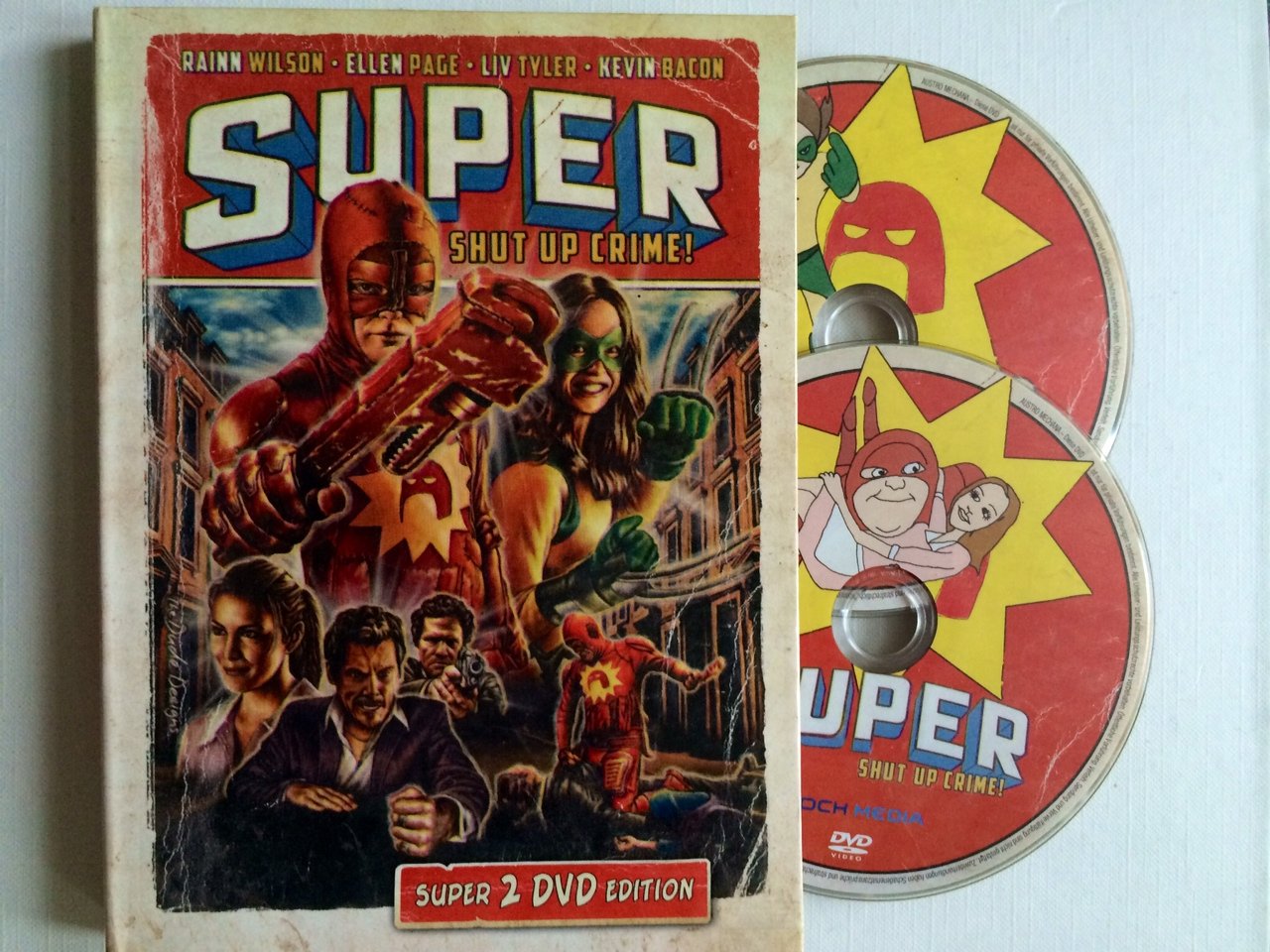 Super (2 Disc Mediabook Edition): Amazon.co.uk: Bacon, Kevin, Tyler, Liv,  Page, Ellen, Wilson, Rainn, Rooker, Michael, Henry, Gregg, Cardellini, ...