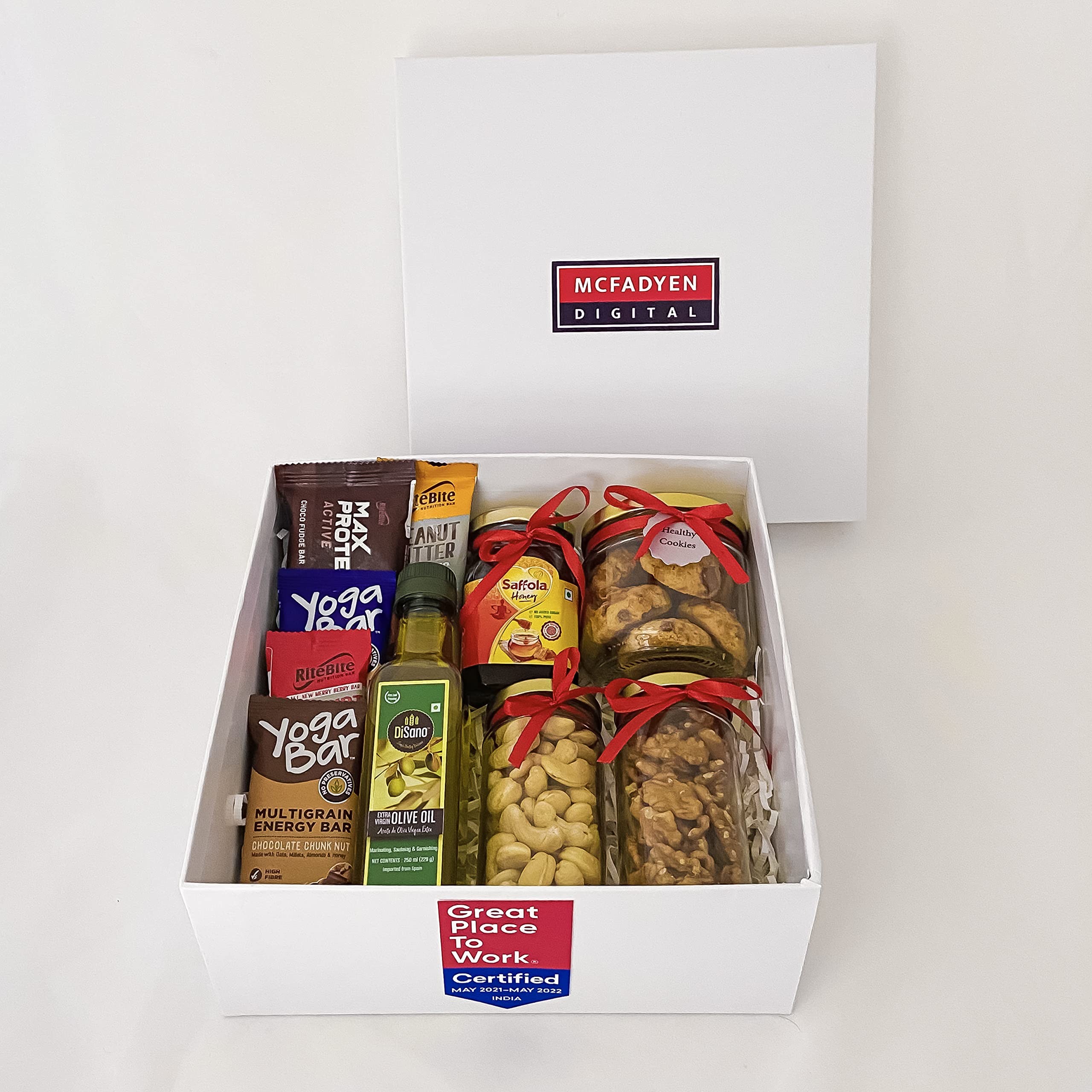 Angroos Healthy Gift Hamper basket for men and women with multigrain energy bar, Max protein, Rite bite, Disano olive oil, Saffola honey, Cookies jar, Nuts jar, Walnuts with bottle