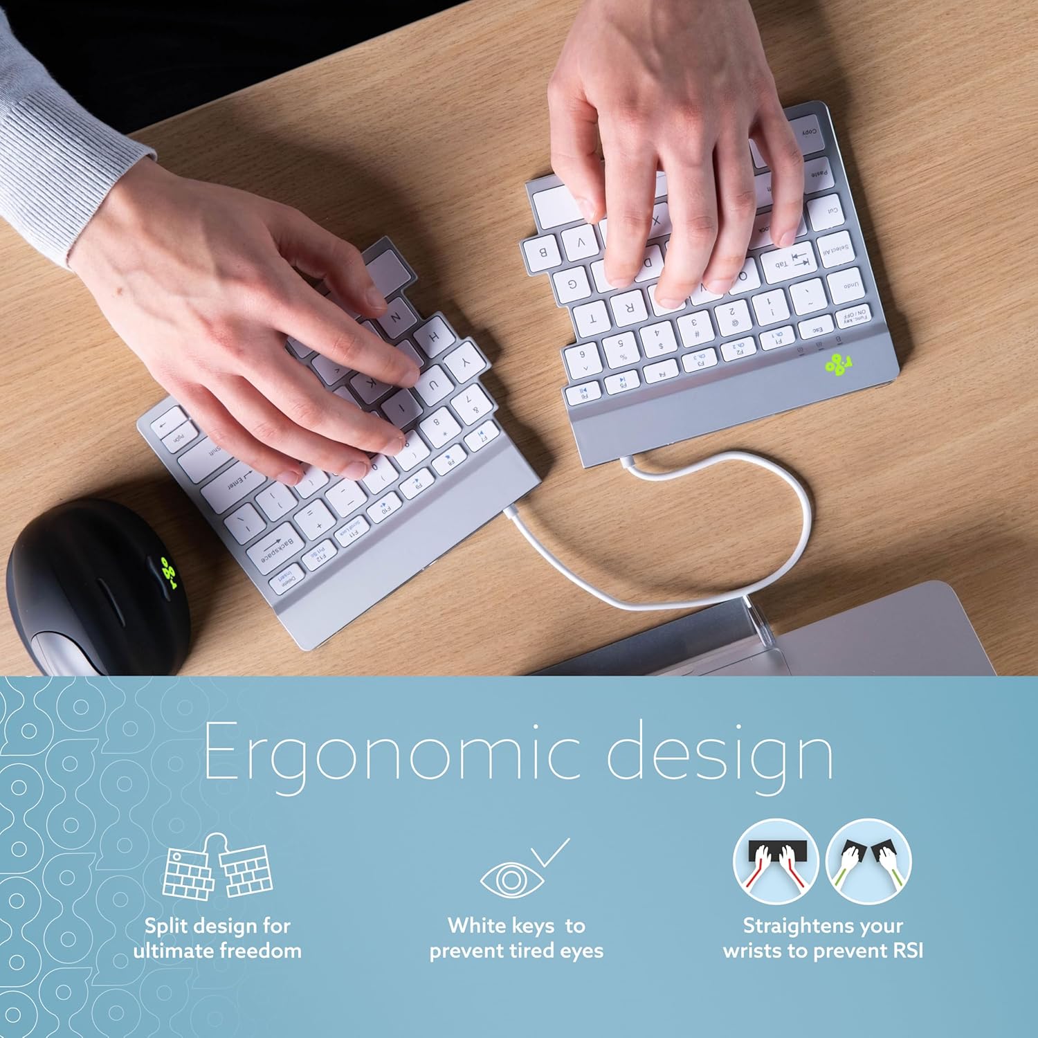 User typing on the R-Go Split Keyboard with hands positioned ergonomically