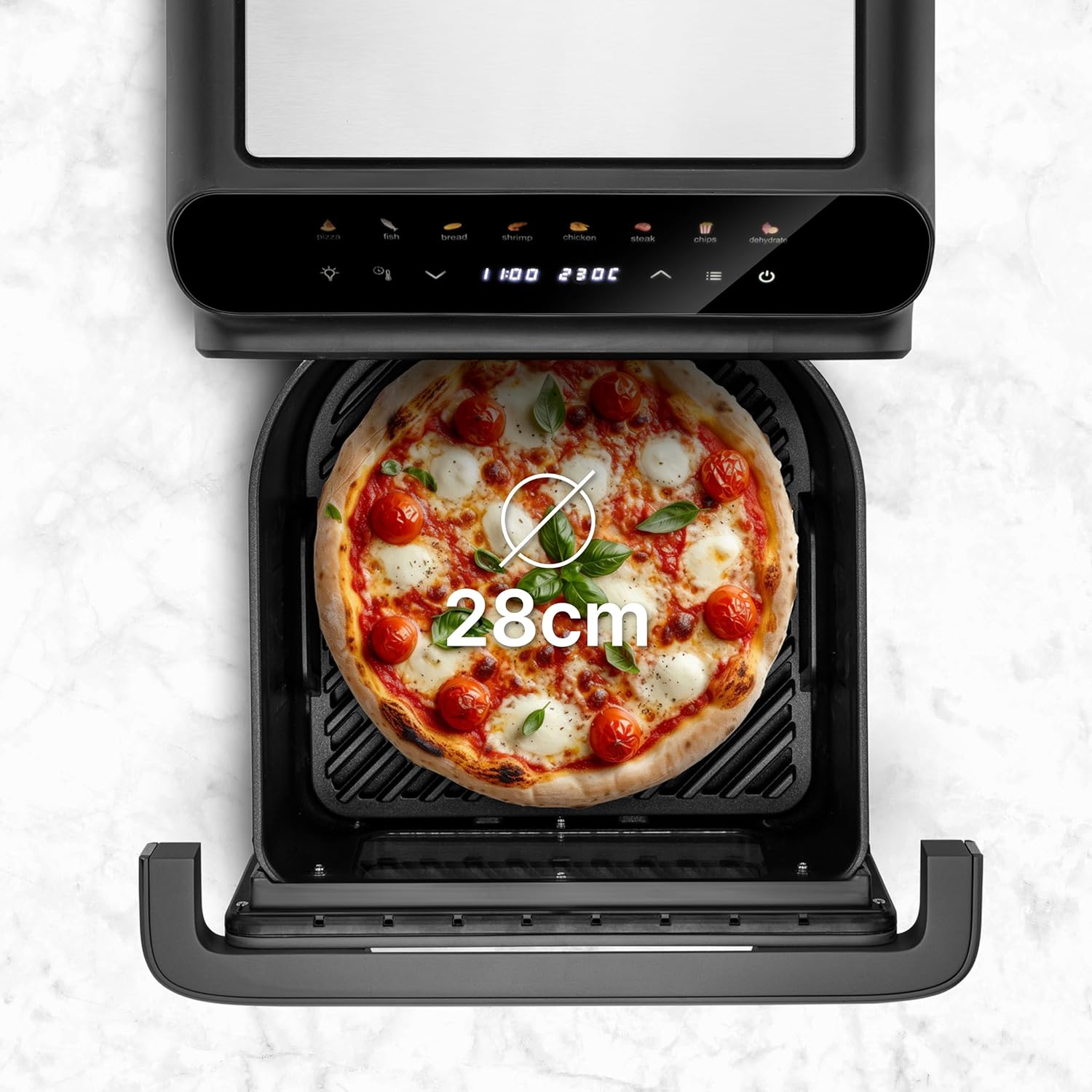 Ufesa Jacana Air Fryer Oven showing a 28cm pizza fitting inside