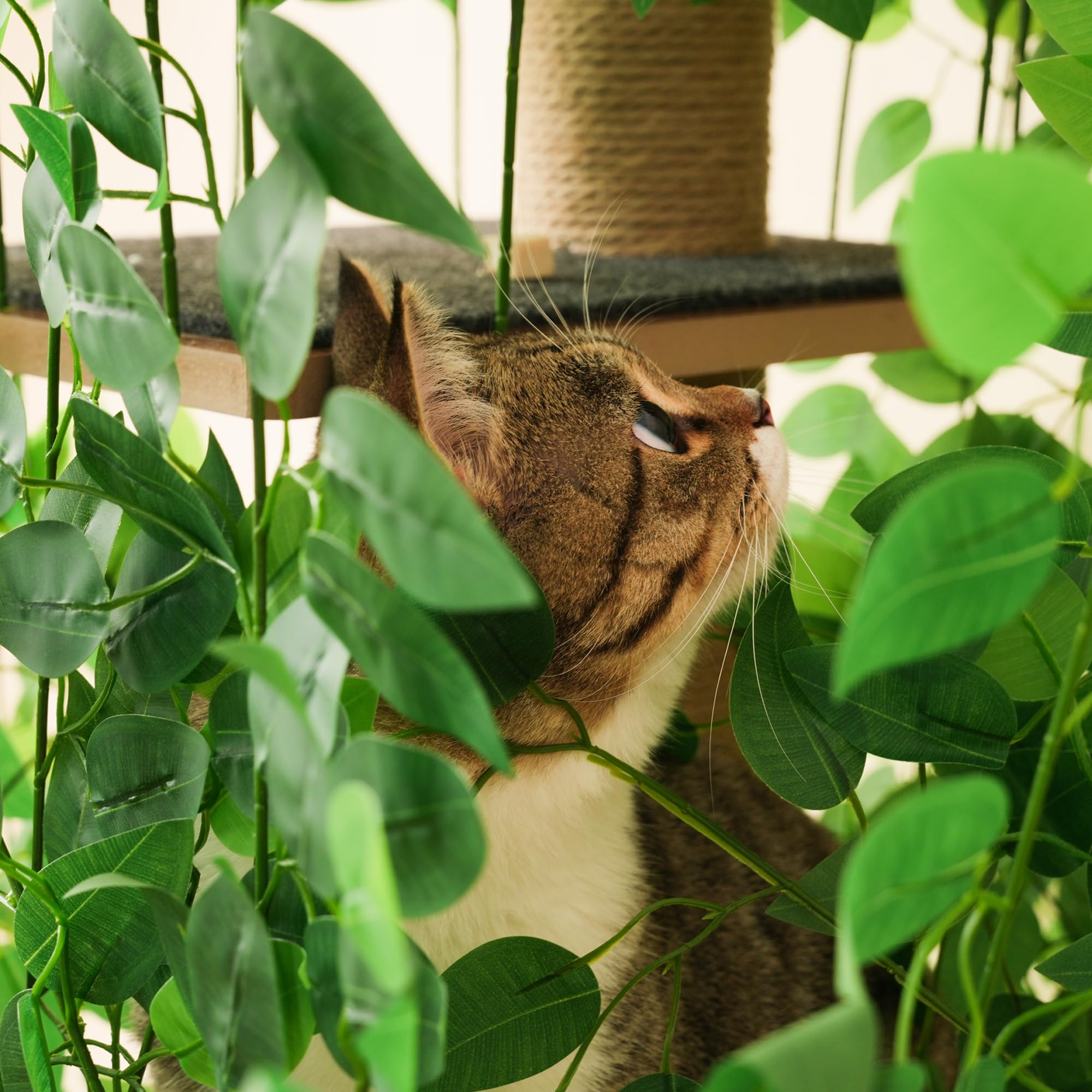Árbol rascador de 190 cm de alto con 4 plataformas y agujeros para gatos. Material seguro para mascotas, hojas extraíbles, impermeable y resistente a la humedad, adecuado para gatos (verde)
