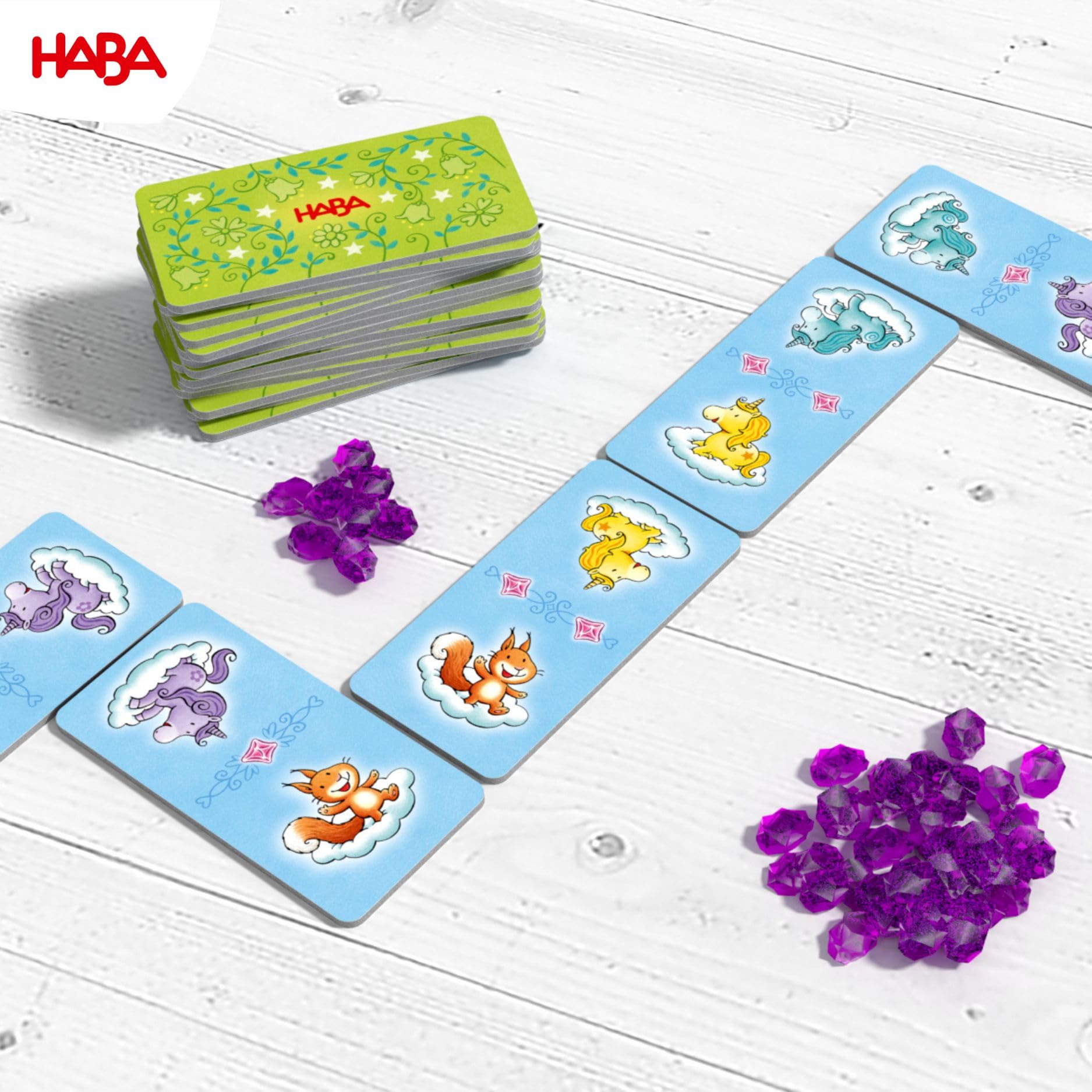 HABA Einhorn Glitzerglück Spielesammlung - 9 abwechslungsreiche Würfel, Brettspiele und Kartenspiele - mit einfachen Regeln - Made in Germany - für Kinder ab 3 Jahren - 2010879002