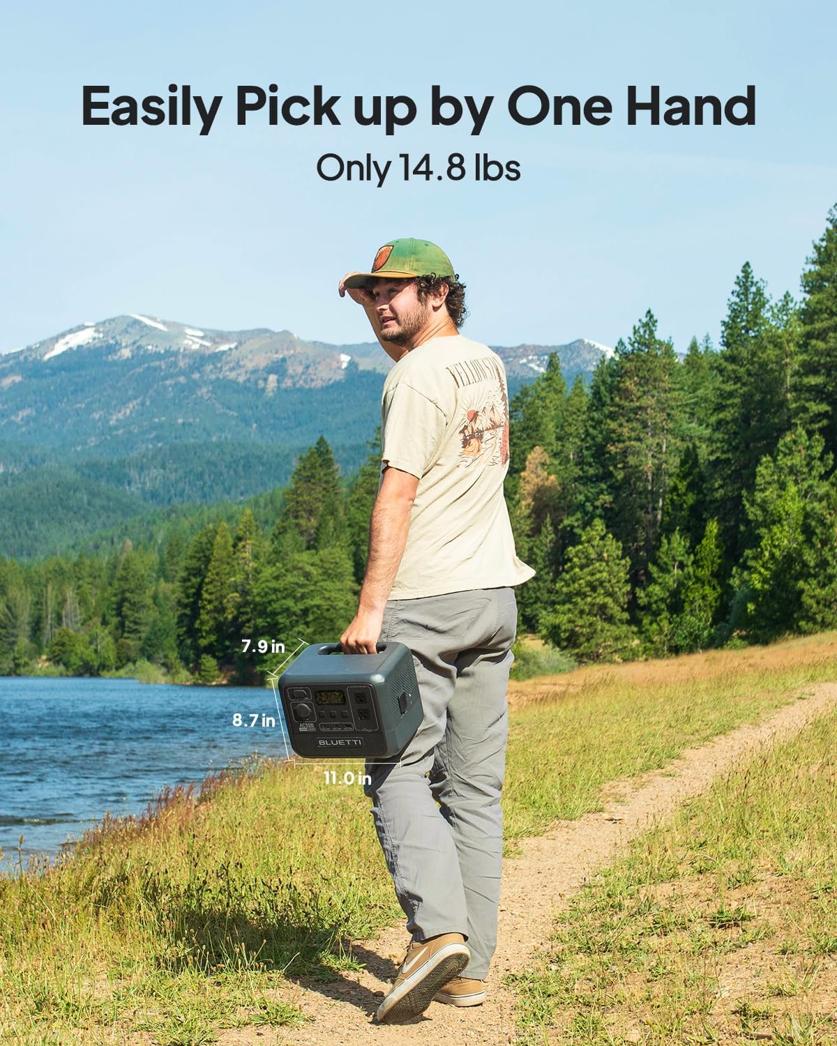 Person carrying the BLUETTI AC50B with one hand in an outdoor setting