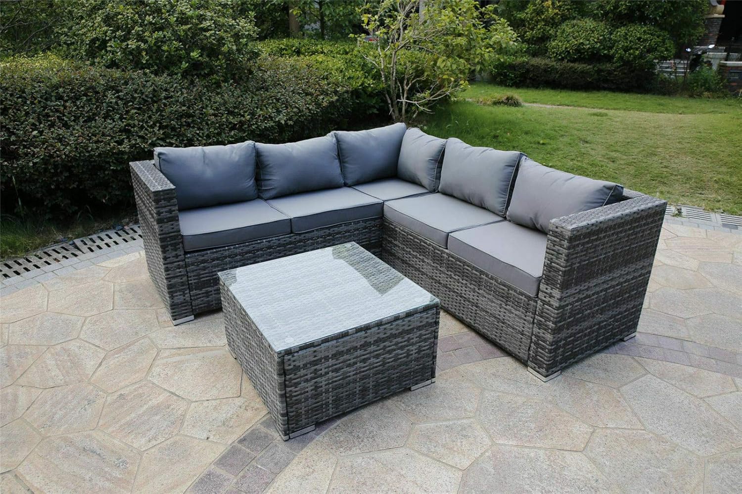 YAKOE Classic Range Rattan Garden Corner Sofa Set on a paved patio