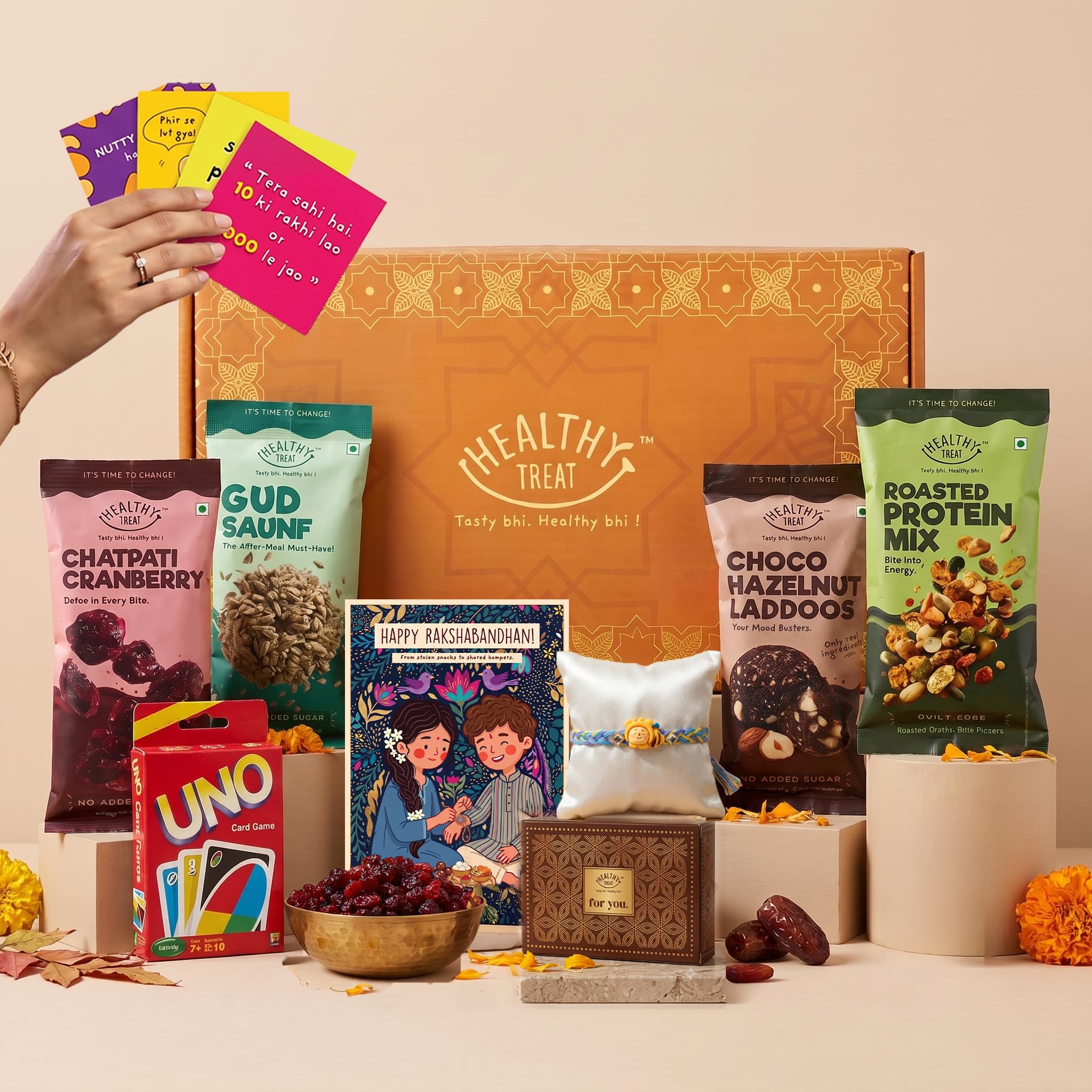 Healthy Treat Junior Treat Rakhi Gift Hamper | Roasted Snacks, Berries, Hazelnut Dry-Fruit Laddoos, Kids-Rakhi, Roli Chawal, Playing Cards | Rakhi's gift for Brother and Sister | Kids'Rakhi Gift Hamper | The Ultimate Assorted Raksha Bandhan Gift