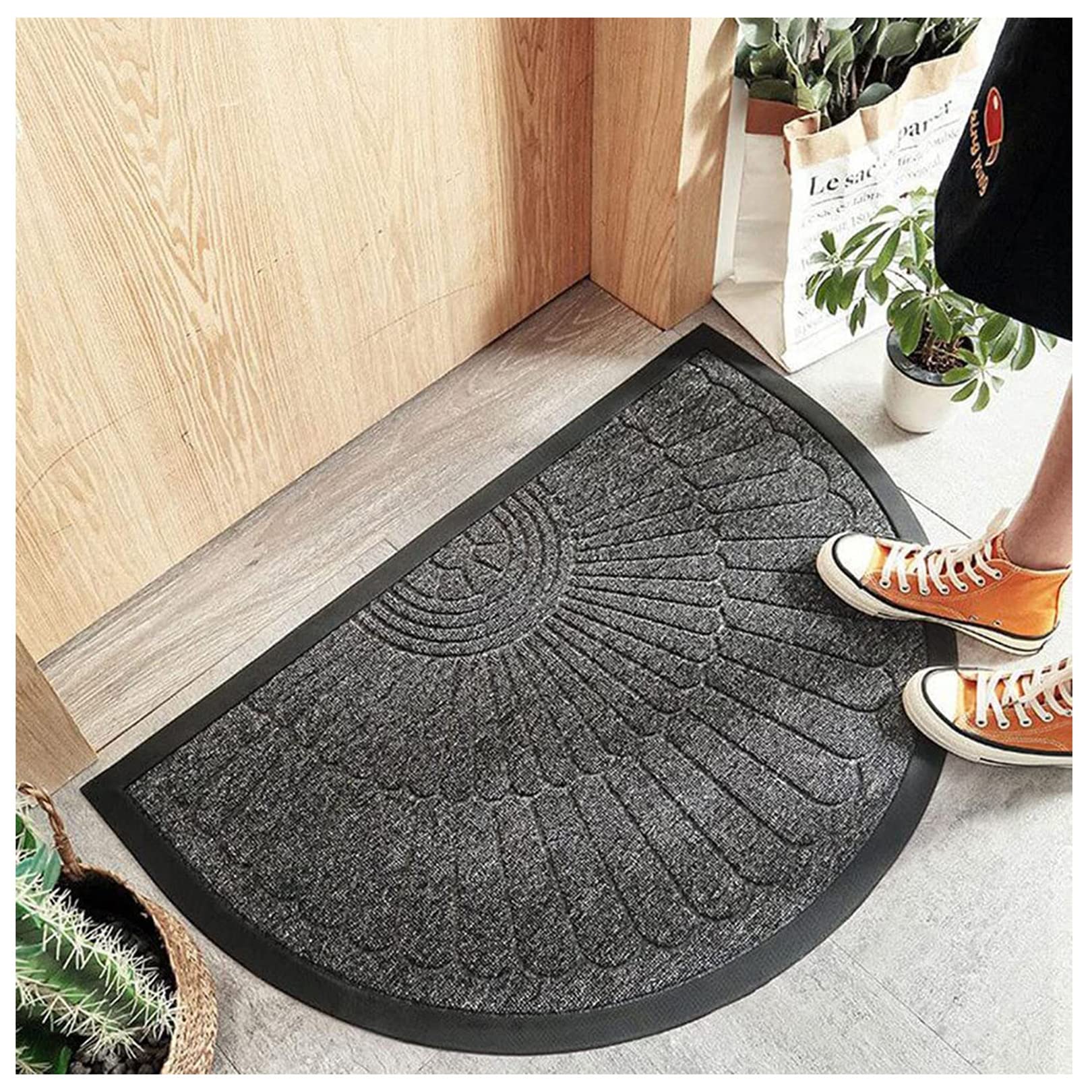 Tapis de porte demi-rond pour une entrée propre en automne