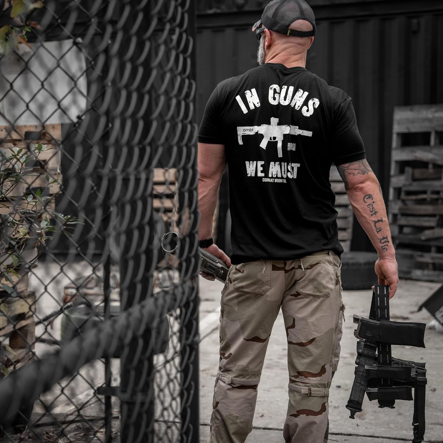 Combat Iron Men’s Graphic T-Shirt – in Guns We Must – Athletic Fit Pre-Shrunk Cotton Poly Blend
