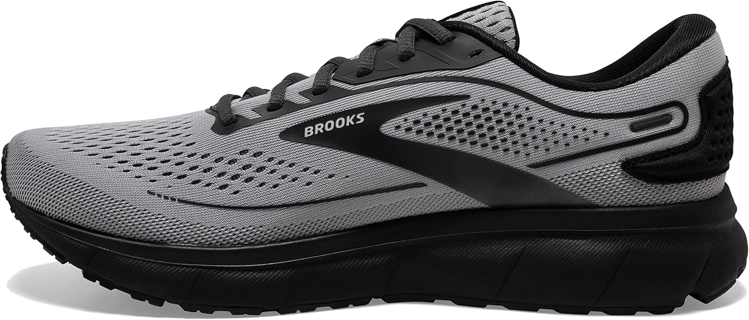 сторона view of a Brooks Trace 2 running shoe in alloy/black/ebony, highlighting the mesh upper and sole design.