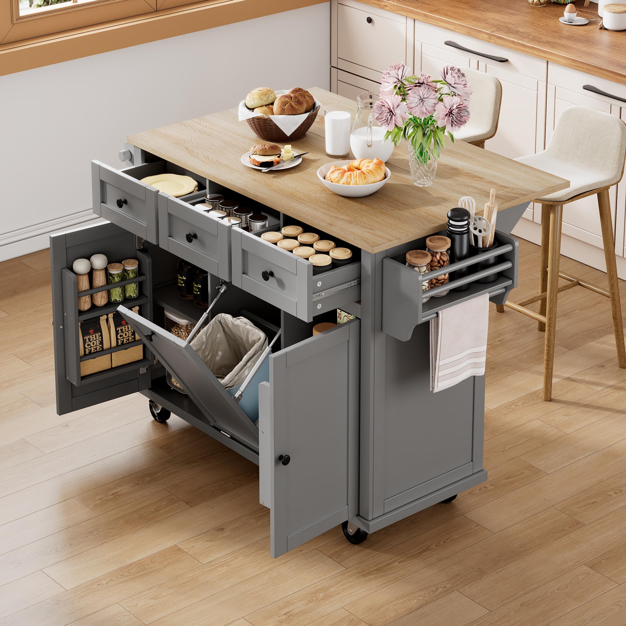 Carrello da cucina espandibile a isola da pranzo grigio con cestino della spazzatura, cassetti spaziali, portaspezie laterale e porta asciugamani, perfetto per piccoli spazi