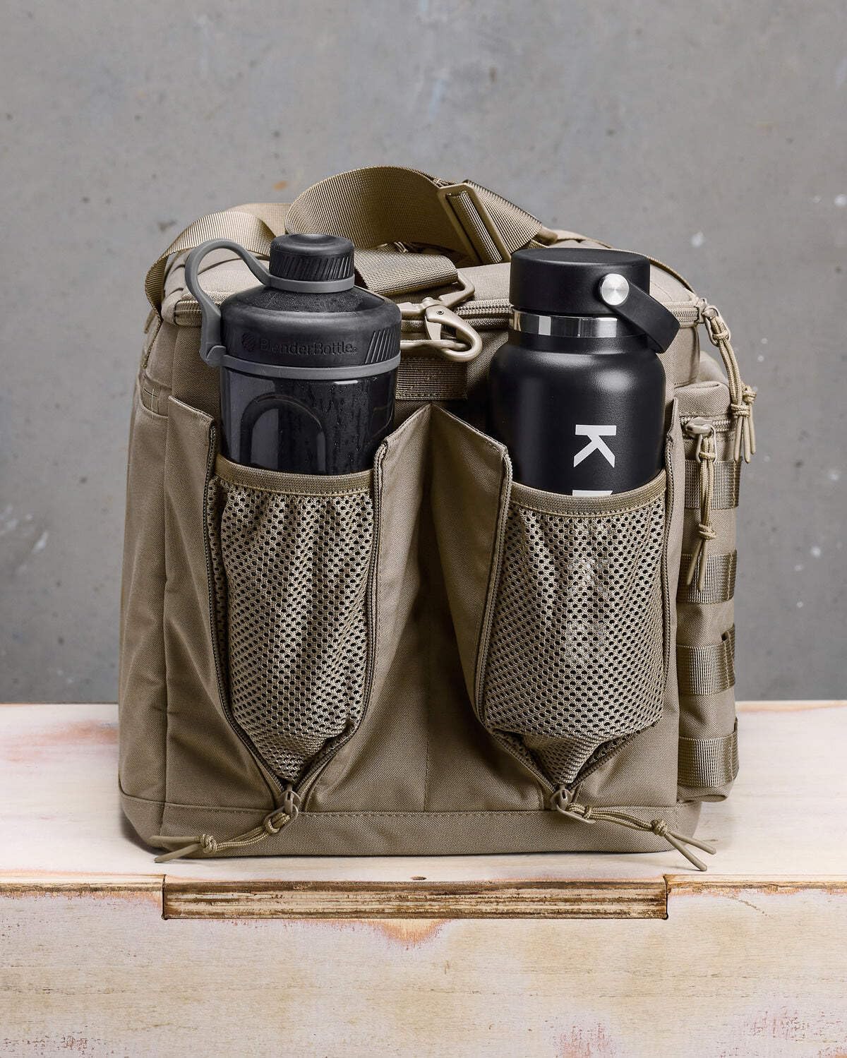 KNKG CONQUER Duffel Bag 40L– Durable Gym Bag with Removable Dividers, Dual Bottle Pockets, Shoe Storage, and Laptop Sleeve - Natty