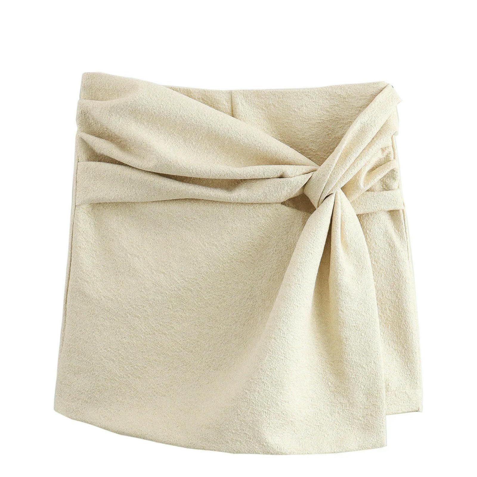 Falda de verano moda mujeres mini faldas lateral cremallera plegable nudo decoración femenina elegante Slim corto faldas calle mujer