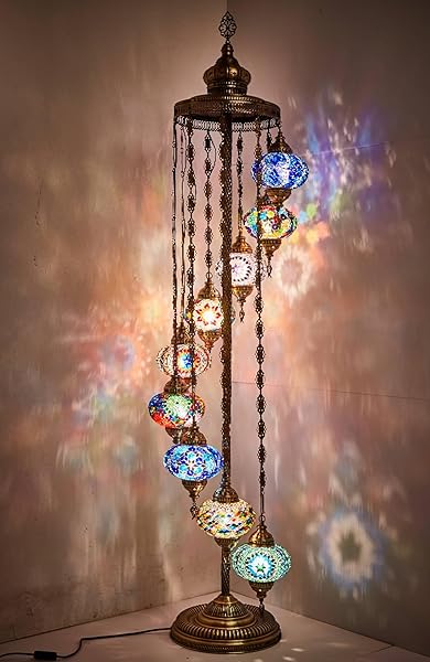 Moroccan mosaic floor lamp with colorful glass globes casting amber and jewel-toned light