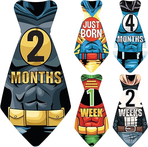 17 corbatines Original Stick'Nsnap (TM) para pegar en monos de bebé, con mensajes por mes, serie "Happy Heroes" (TM). Acontecimientos para 12 meses