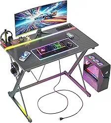 TIQLAB Mesa de jogos com tomadas elétricas e LED de 81 cm ergonômica para computador com superfície de fibra de carbono, estação de trabalho de PC com gancho de fone de ouvido para quarto, presente
