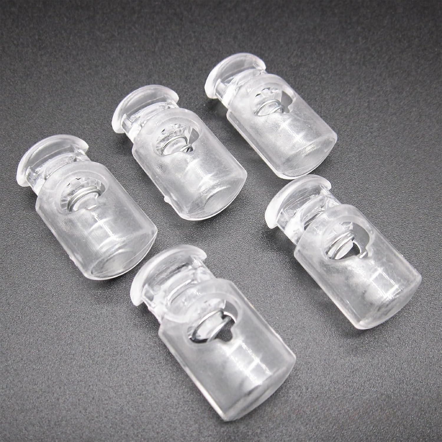 100PCS Plastic Clear Cord Locks for Drawstring ，Cord Locks for Clothing, Shoes, and Rope，Shoelaces Drawstrings Paracord Bags Clothing, and More,Cordlock Stoppers for Drawstrings, Bags & More.