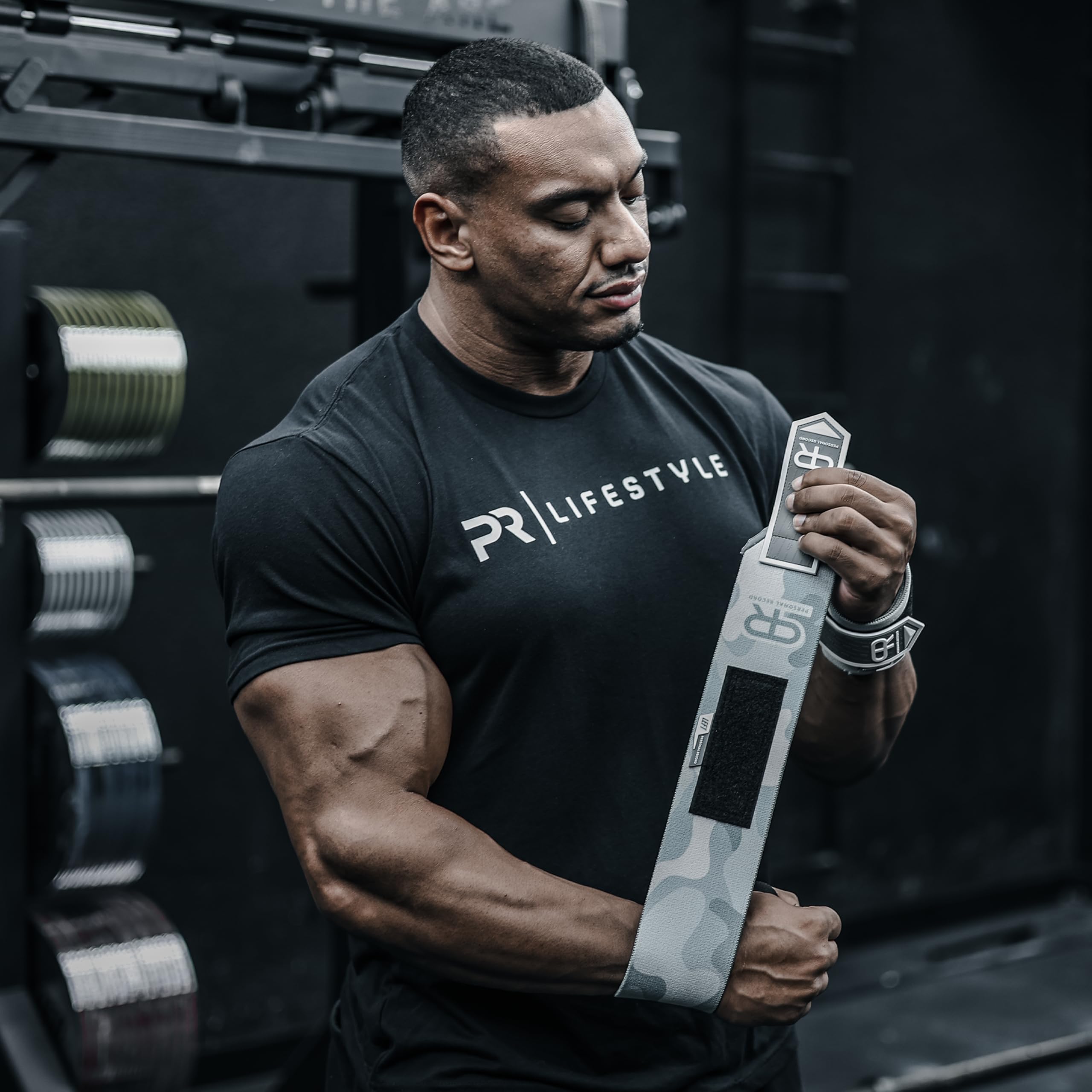 PR Personal Record Polsiere resistenti di alta qualità, più elasticità, cuciture rinforzate, cinghia extra larga, passante per pollice forte, fasce per sollevamento pesi Larry Wheels