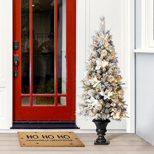 Glitzhome Árbol de Navidad artificial de pino flocado preiluminado de 5 pies con 150 luces blancas cálidas y flor de pascua para decoraciones de