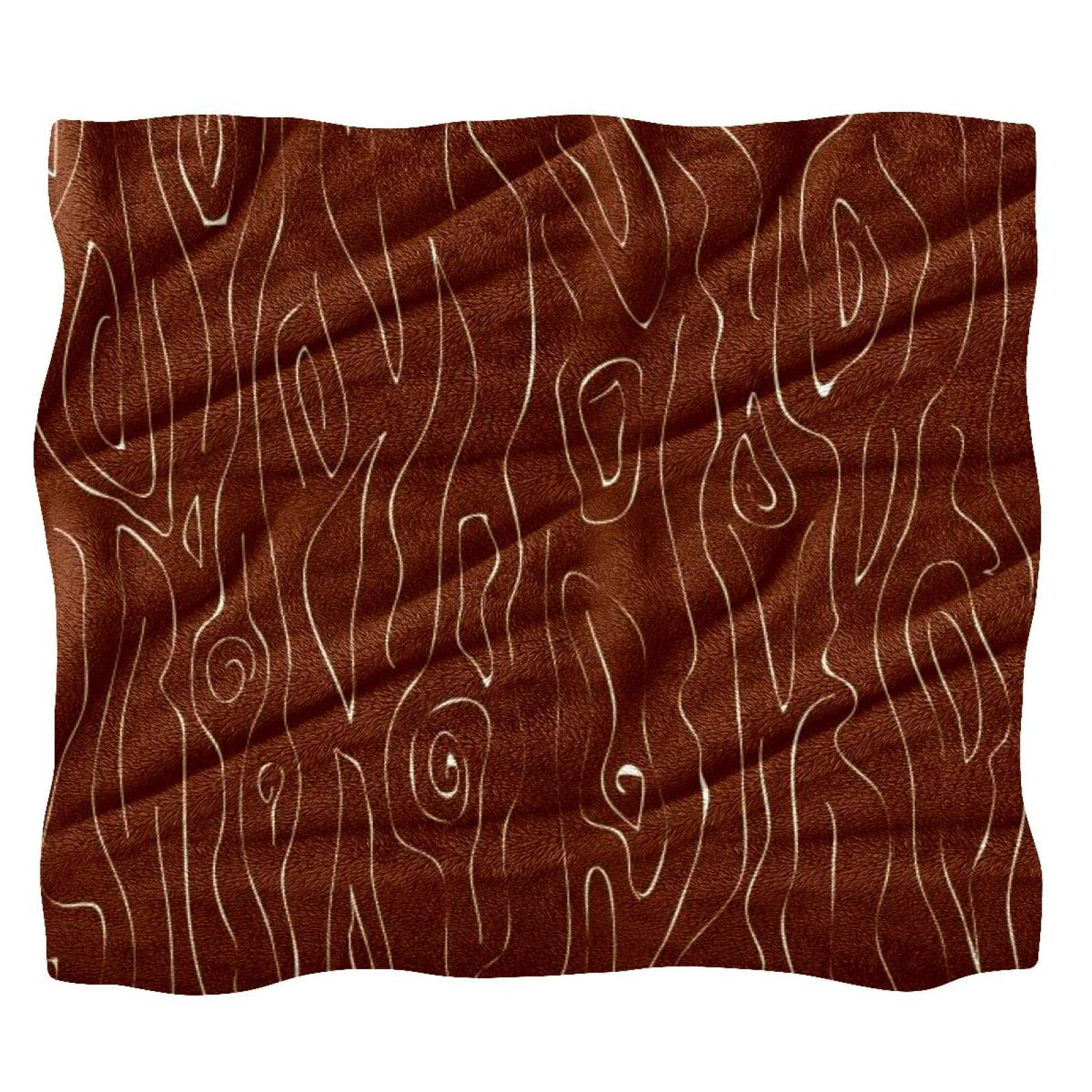 Couverture en polaire anneau d'arbre pour vos soirées cocooning sur le canapé