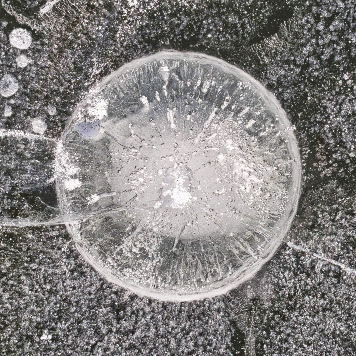Ice Fishing Hole XVI Photograph