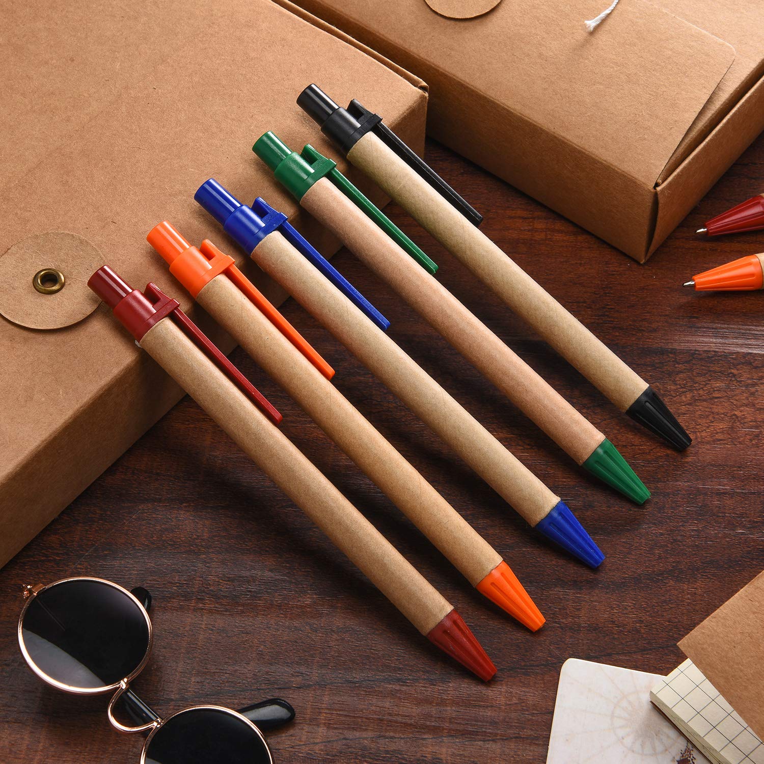 Outus - Bolígrafos de papel Kraft de 100 unidades, bolígrafos de tinta negra, retráctiles, de punta media, 0,7 mm, para material de escritura para la oficina de la escuela, multicolor