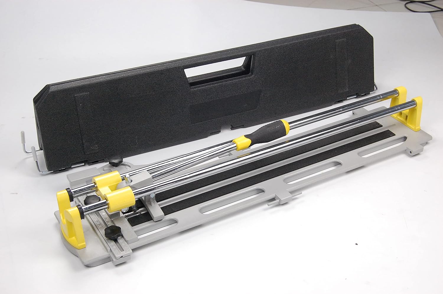 Plasplugs Portable 600mm Manual Tile Cutter, with unique support panels that turn into a carry