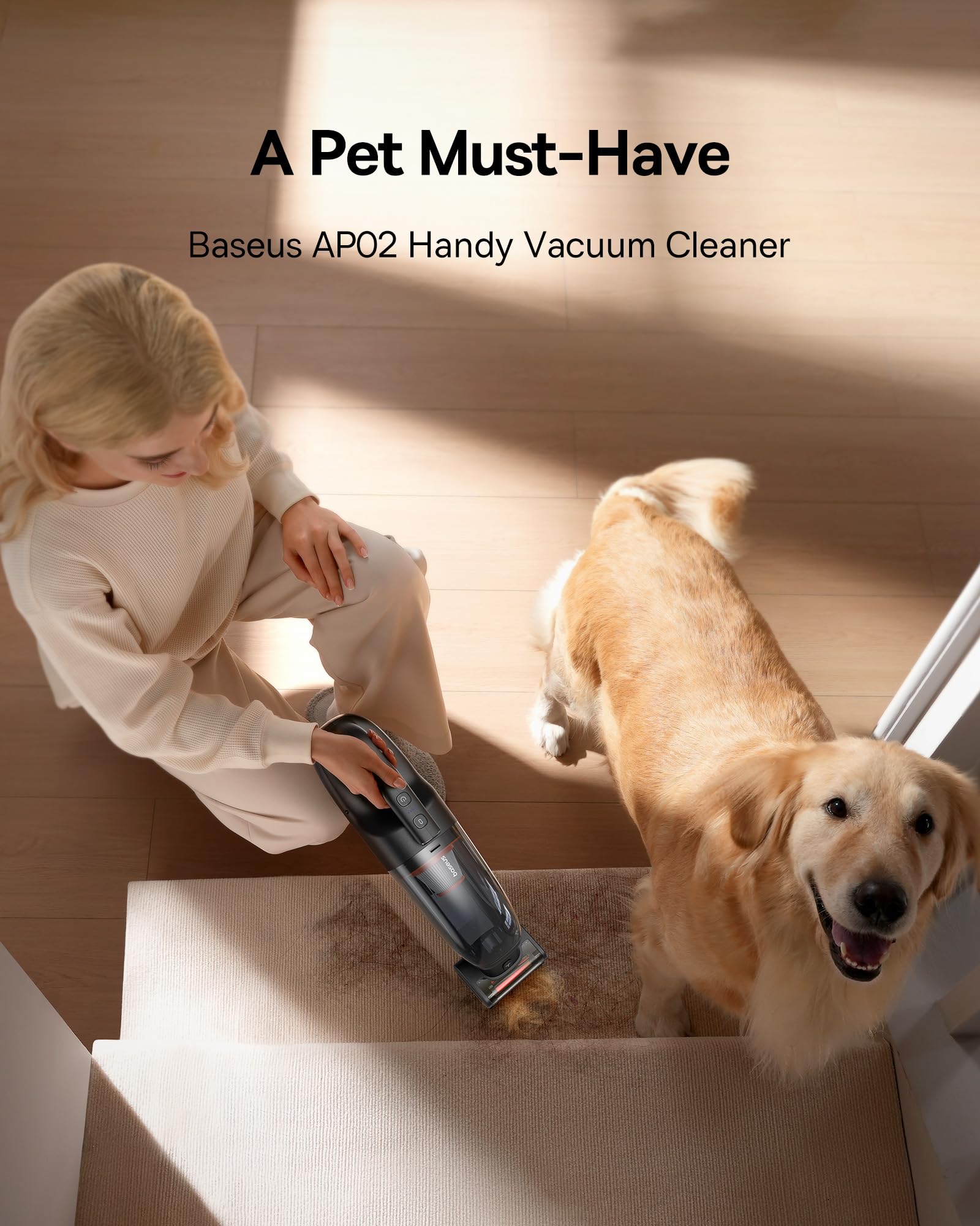 Baseus AP02 vacuum being used on stairs with a dog