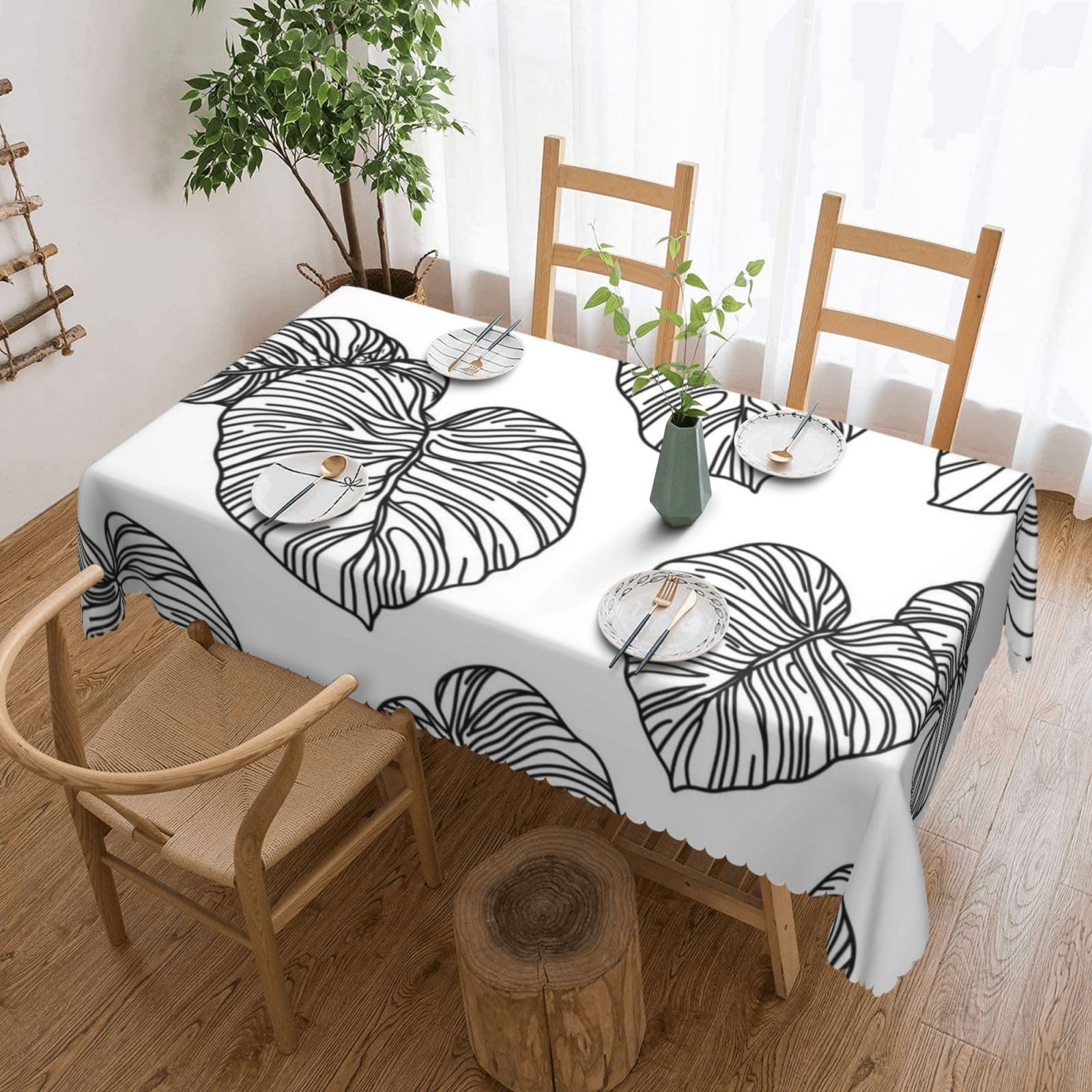 Nappe motif de feuilles noires et blanches fini les taches table 137x183