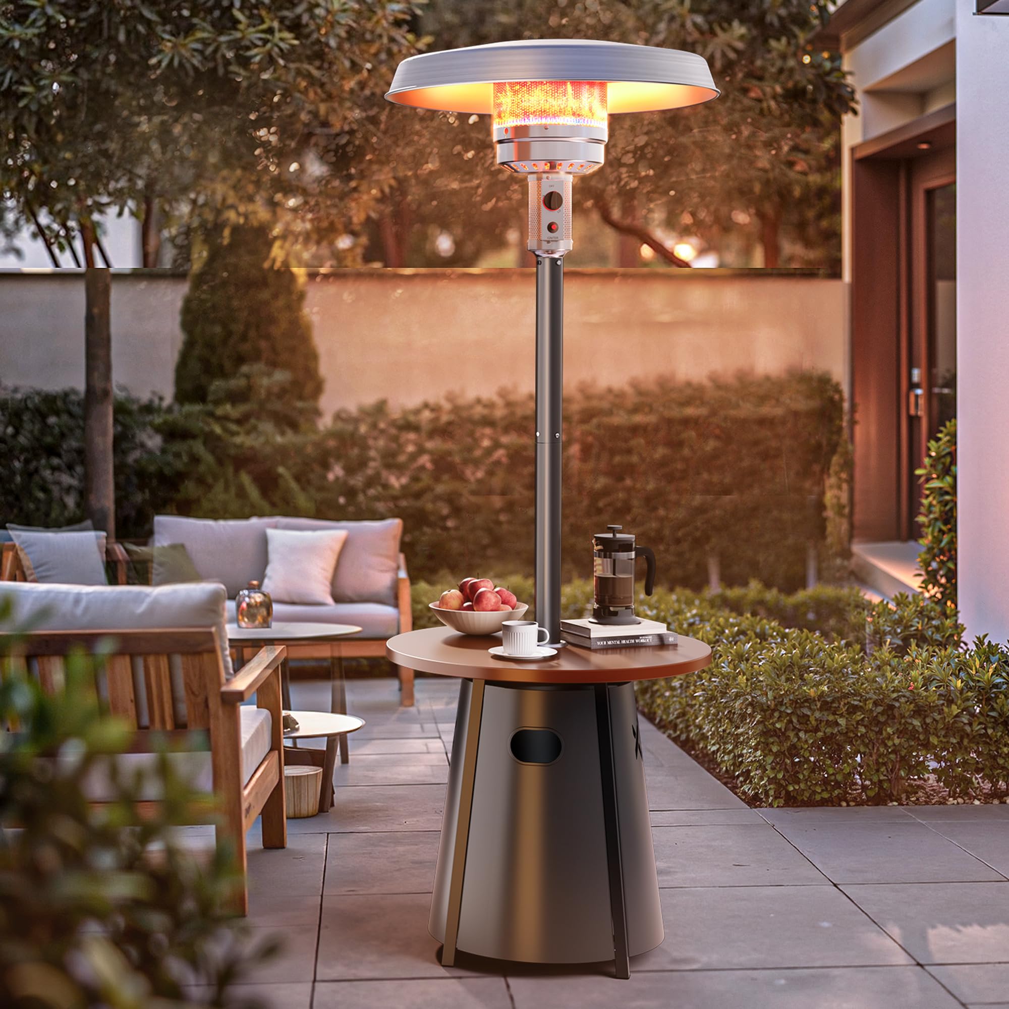 Pamapic 50,000 BTU propane patio heater in dark brown standing on a deck near a pool, the round stainless tabletop and premium 304 stainless steel burner at the top, the cone-shaped base for wind stability and a magnetic-lock tank door at the bottom — the best premium standing pick for buyers wanting a top-of-range finish