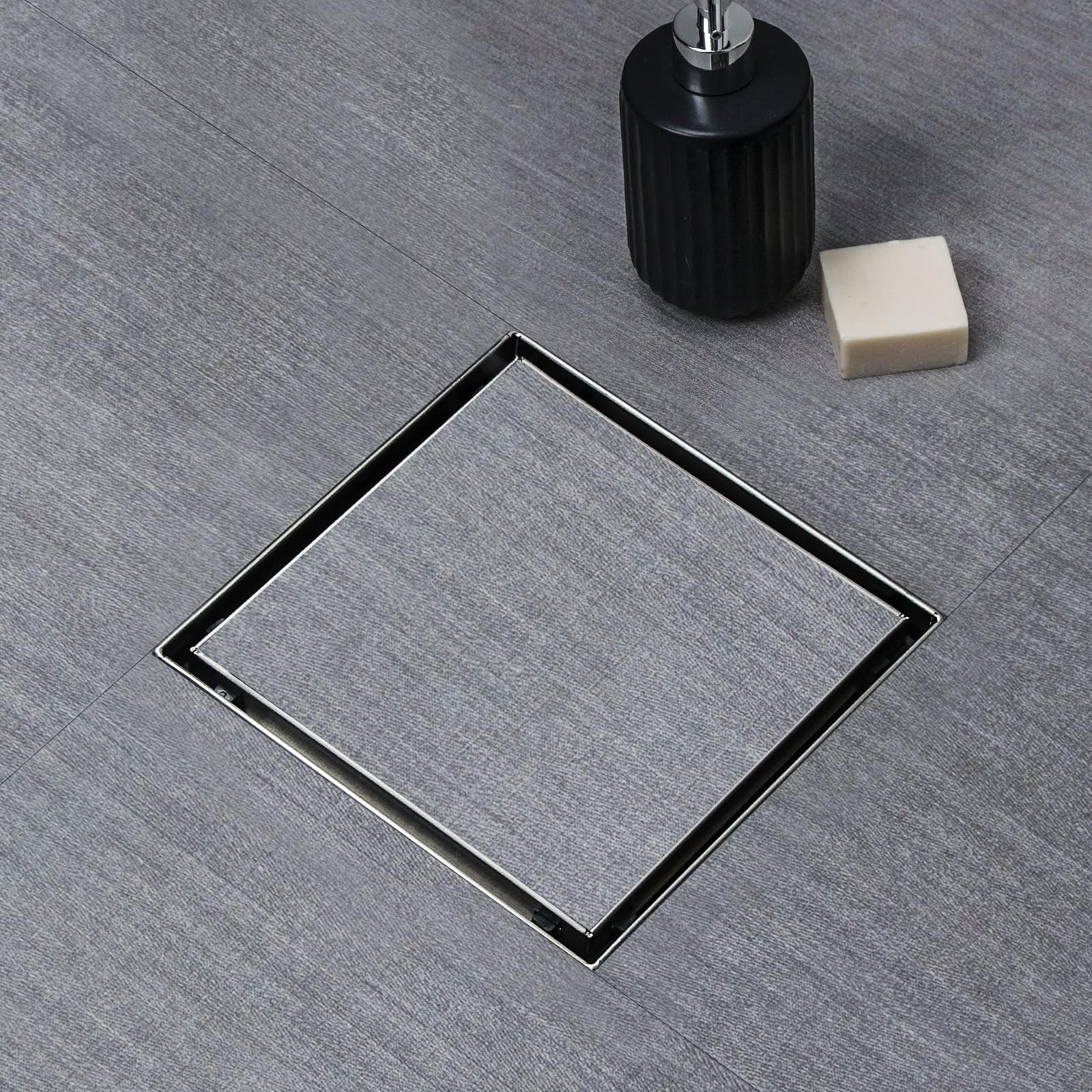 SaniteModar Square Shower Drain 4 inch Comes with Tiled Stealth and 304 Stainless Steel Brushed 2 in 1 Panels. The Shower Drain is Equipped Hair Filters and Threaded Joint with Rubber Seal