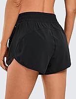 Vista 2 de CRZ YOGA Pantalones cortos de correr de cintura alta para mujer, 2.5 pulgadas, forro de secado rápido, pantalones cortos de entrenamiento atlético