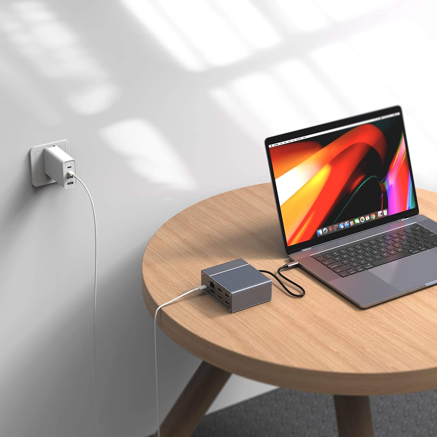 Laptop connected to Hyper Drive GEN2 12-in-1 USB-C Hub and power adapter.