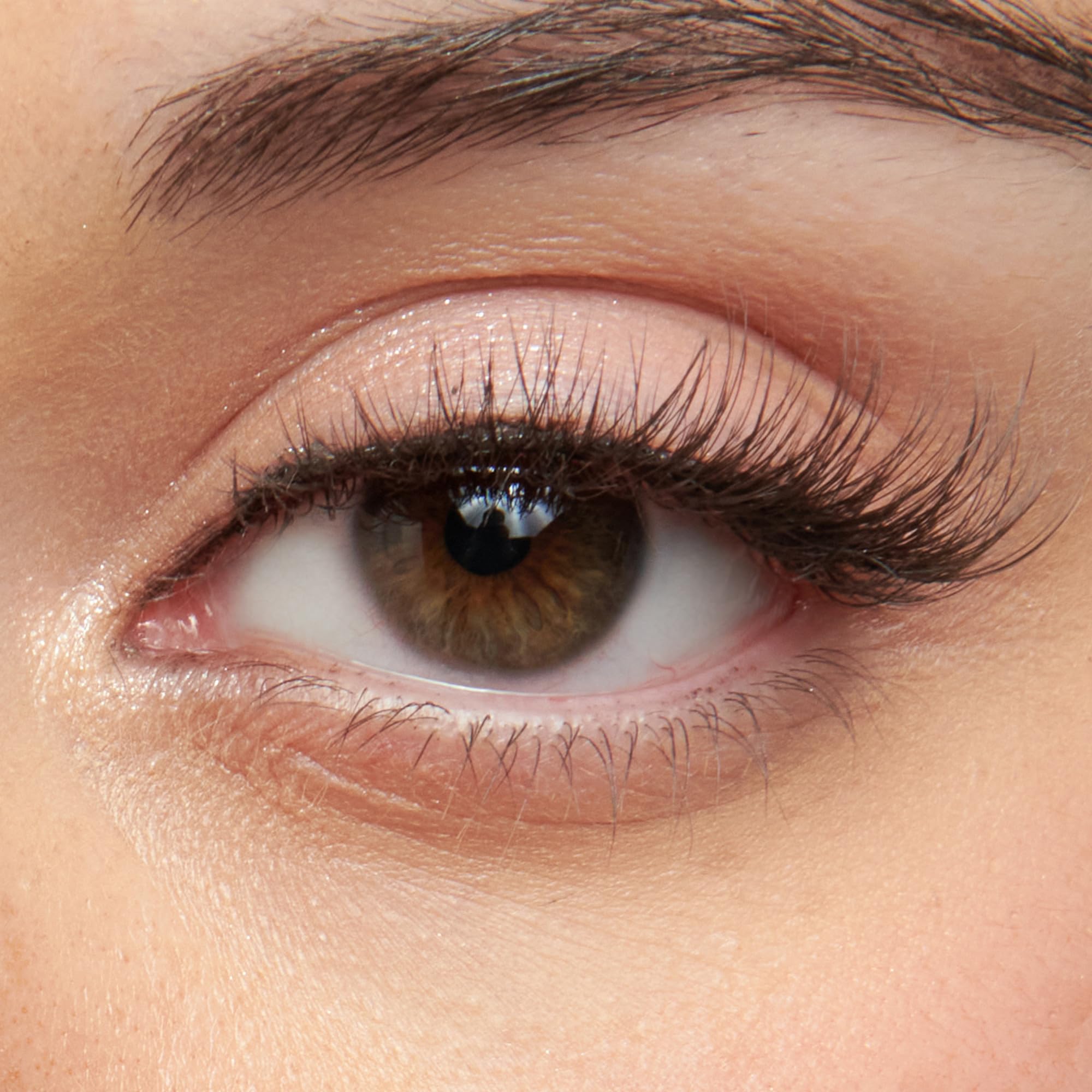 A close-up of KISS So Wispy Lashes showcasing their crisscross pattern and softly curled ends.