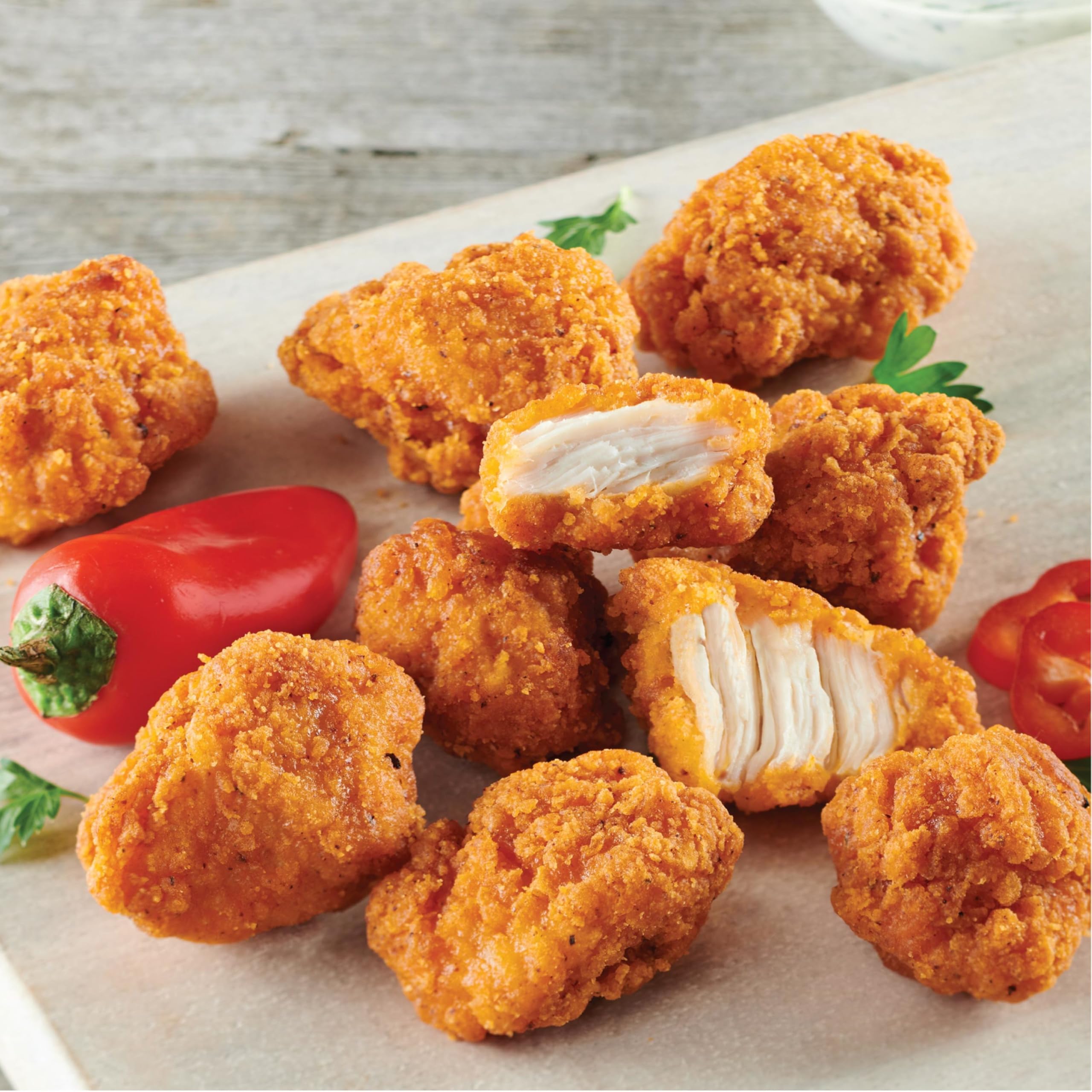Just Bare Chicken Lightly Breaded Spicy Breast Bites Fully Cooked 16 G Protein Frozen 1 50 LB — view 3