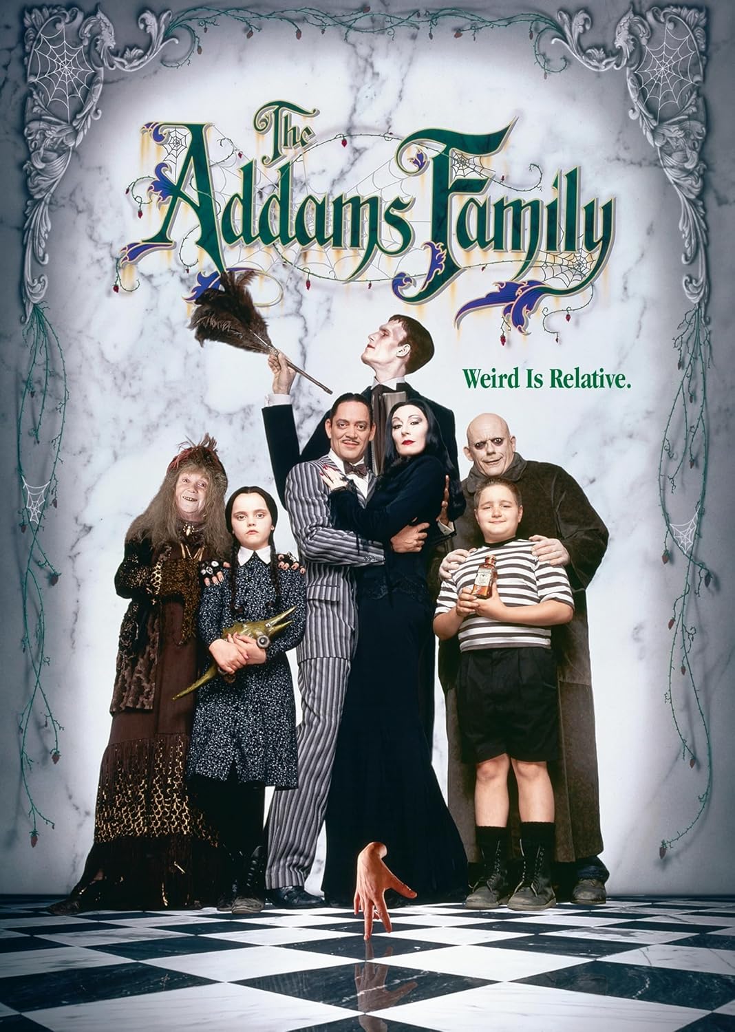 The Addams Family posing in their gothic mansion