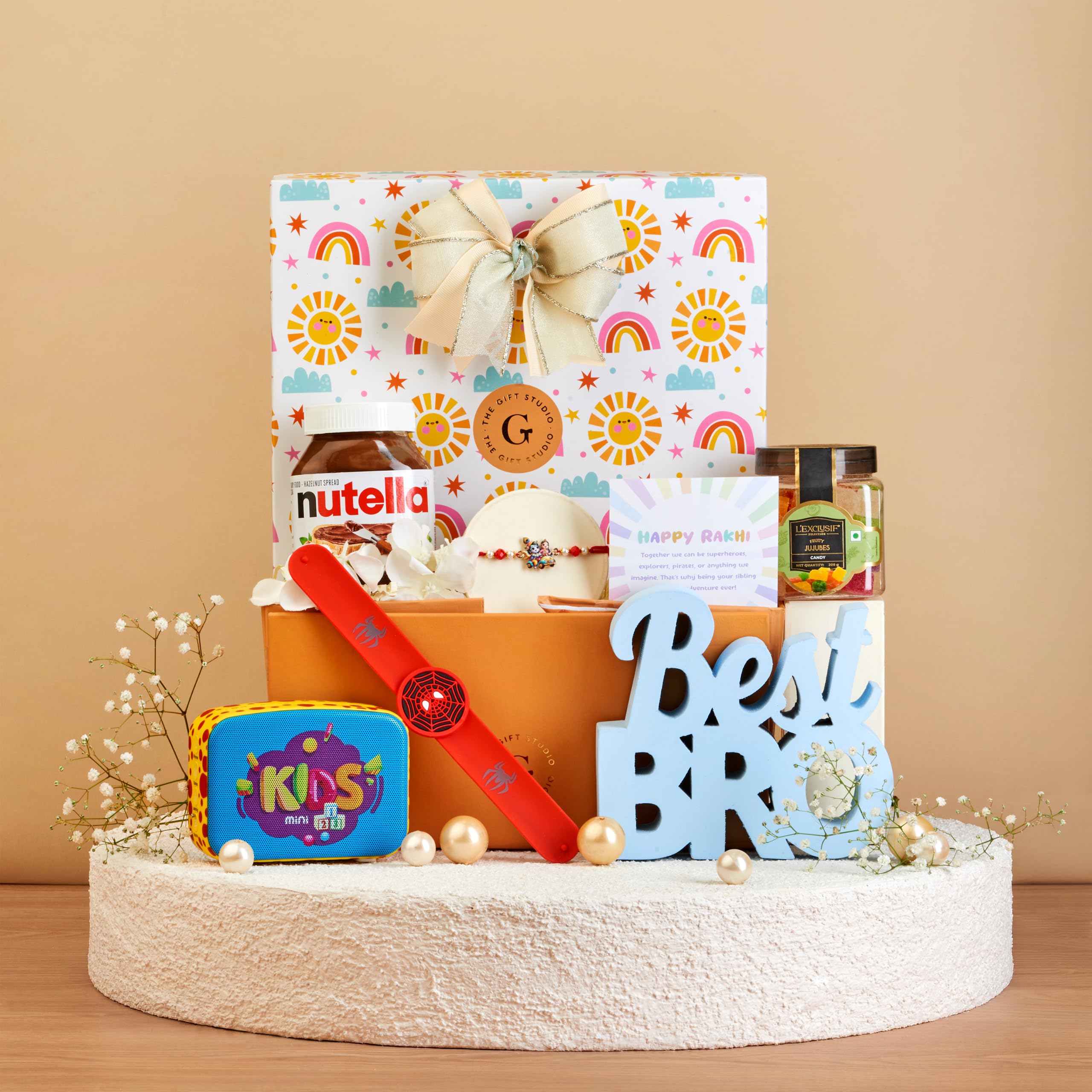 THE GIFT STUDIO.COM | The Musical Radha Krishna Kids Rakhi Hamper | Radha Krishna Kids Rakhi, Saregama Mini Carvaan, Nutella & Gift Box | Raksha Bandhan Gift-image-36