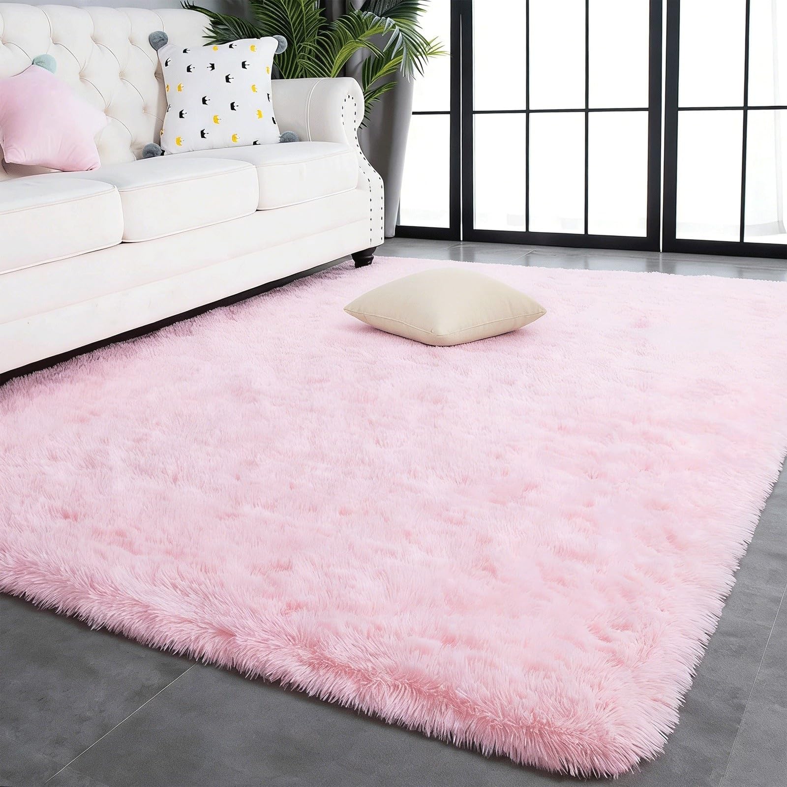 Tapis de salon rose douillet pour une atmosphère chaleureuse en famille