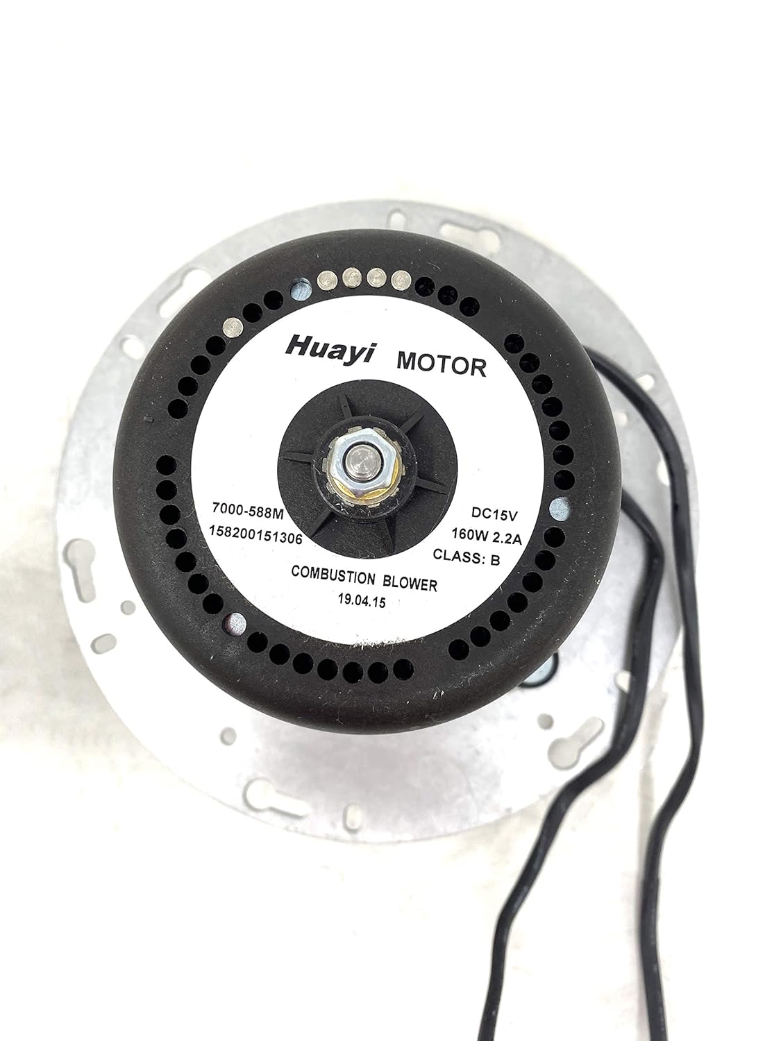 Na baya view of the Quadra-Fire SRV7000-588M combustion blower motor with specification label.